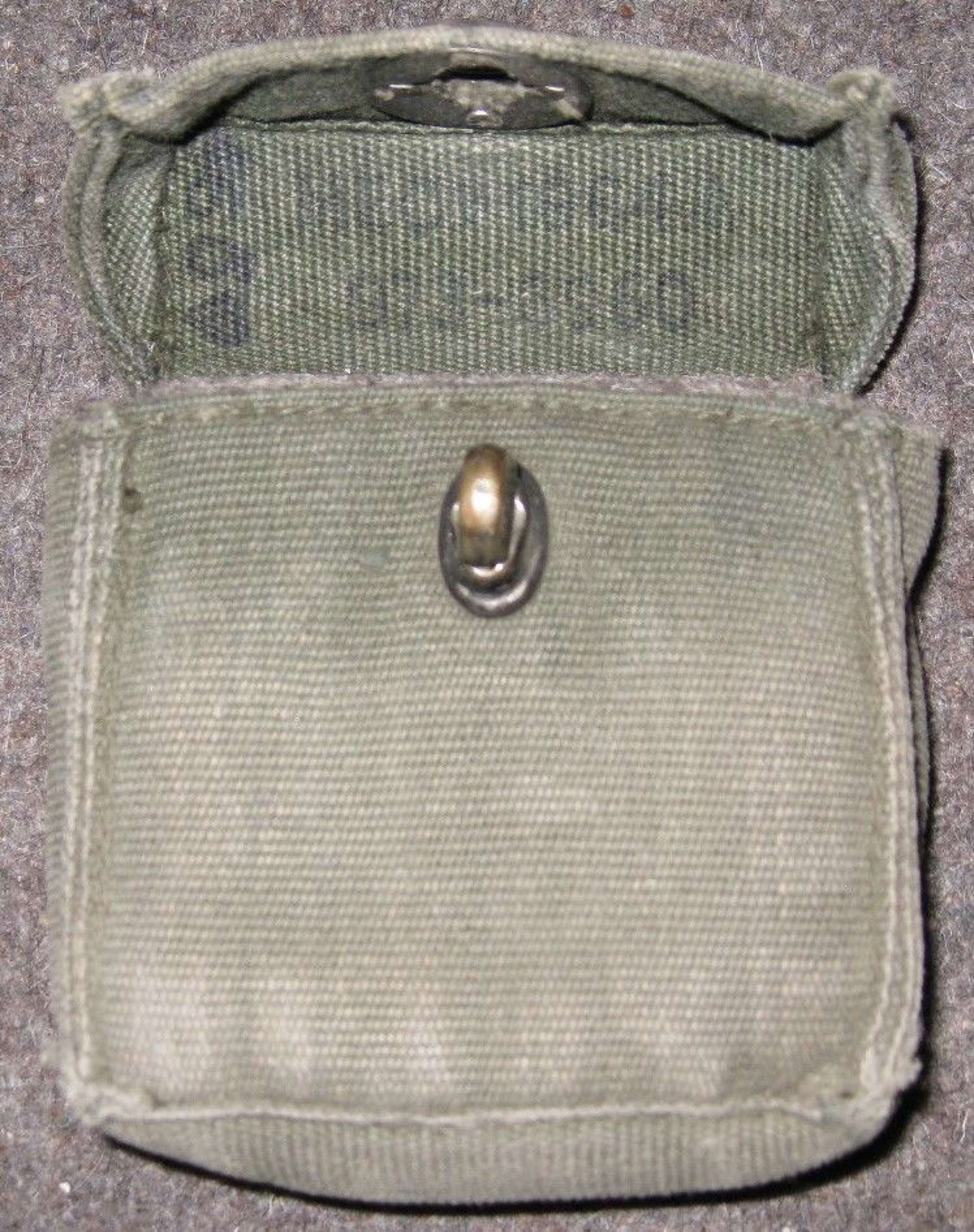A 1964 DATED 58 PATTERN COMPASS POUCH