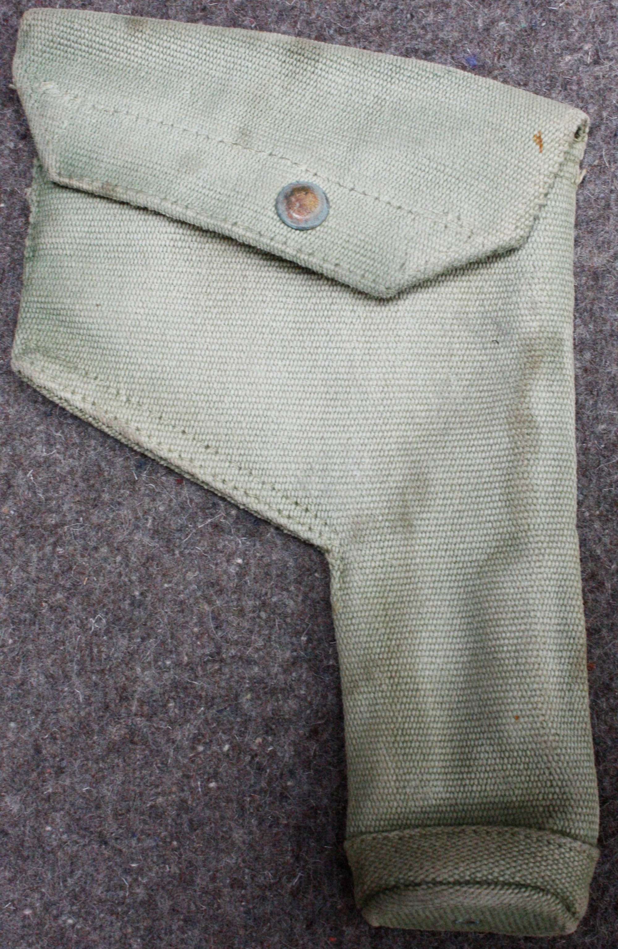 A WWII 37 PATTERN WEBBING USED HOLSTER