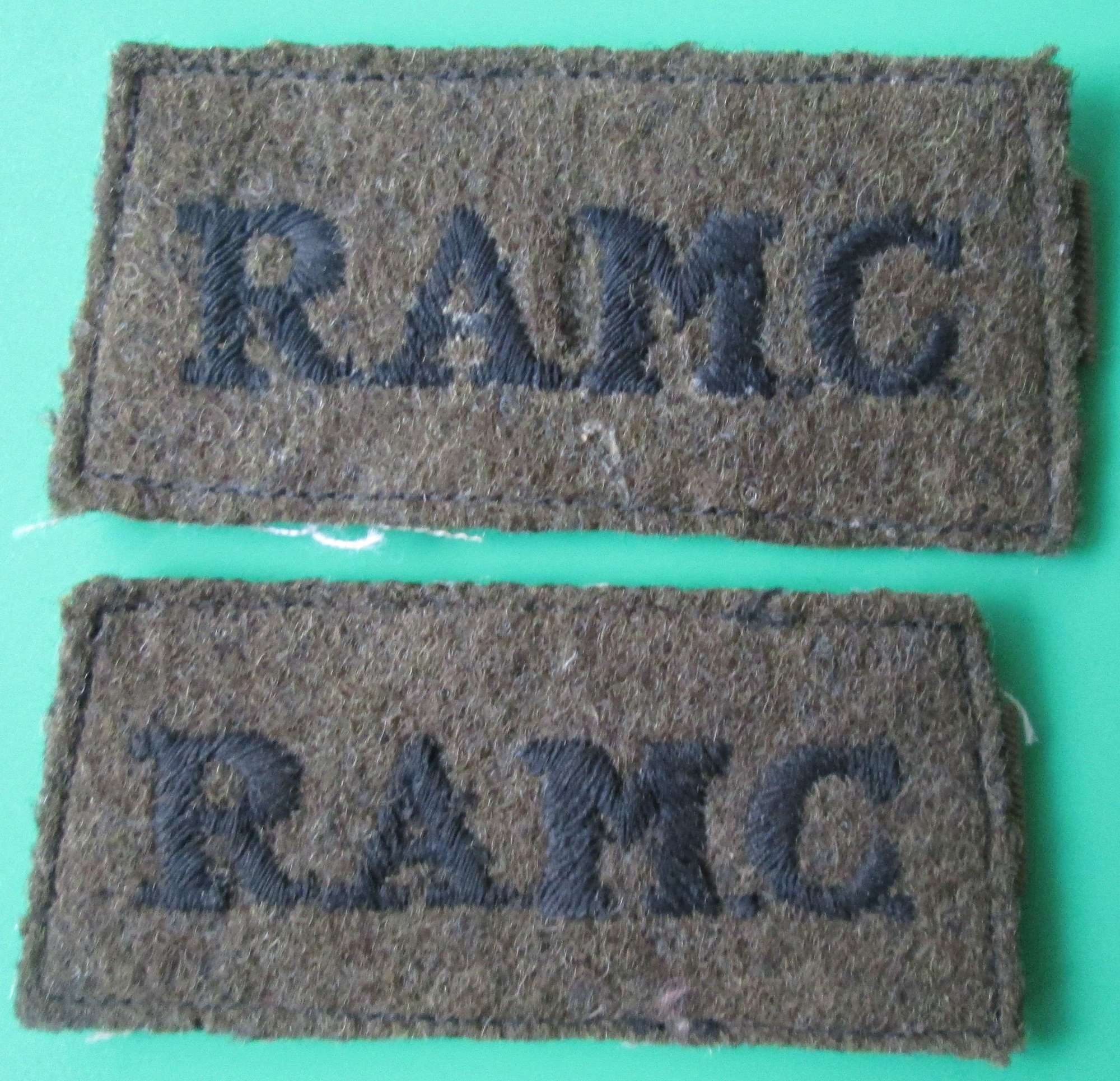 A PAIR OF SLIP ON TITLES FOR THE RAMC