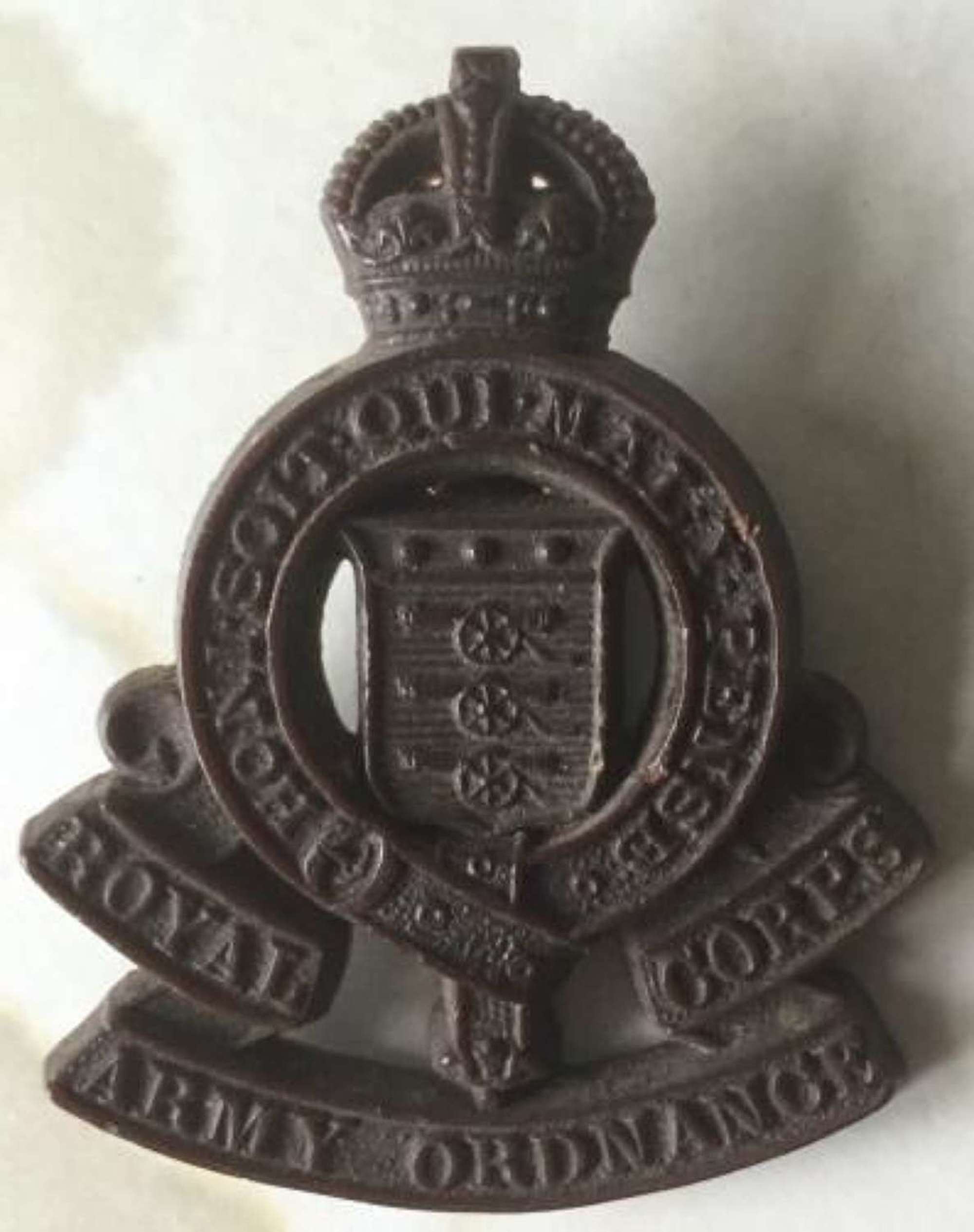 Royal Army Ordance Corp Plastic Economy Cap Badge