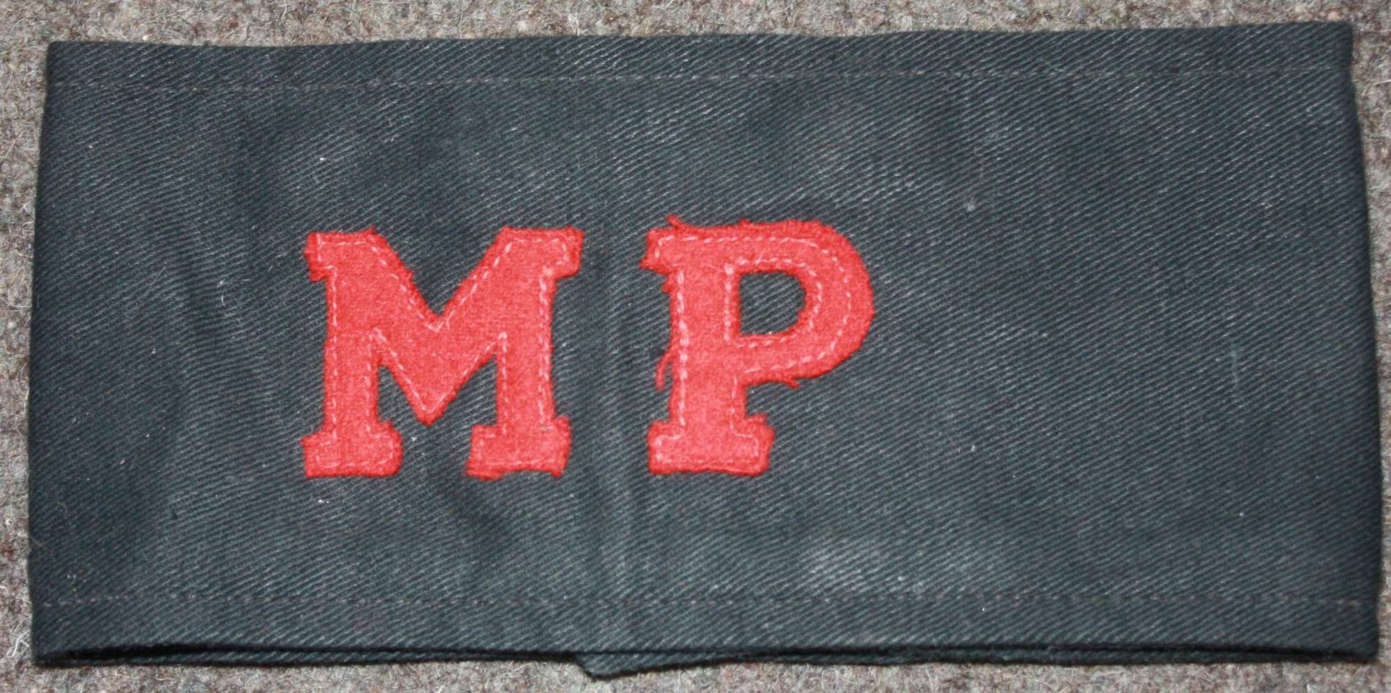 A WWII PERIOD MP'S ARMBAND
