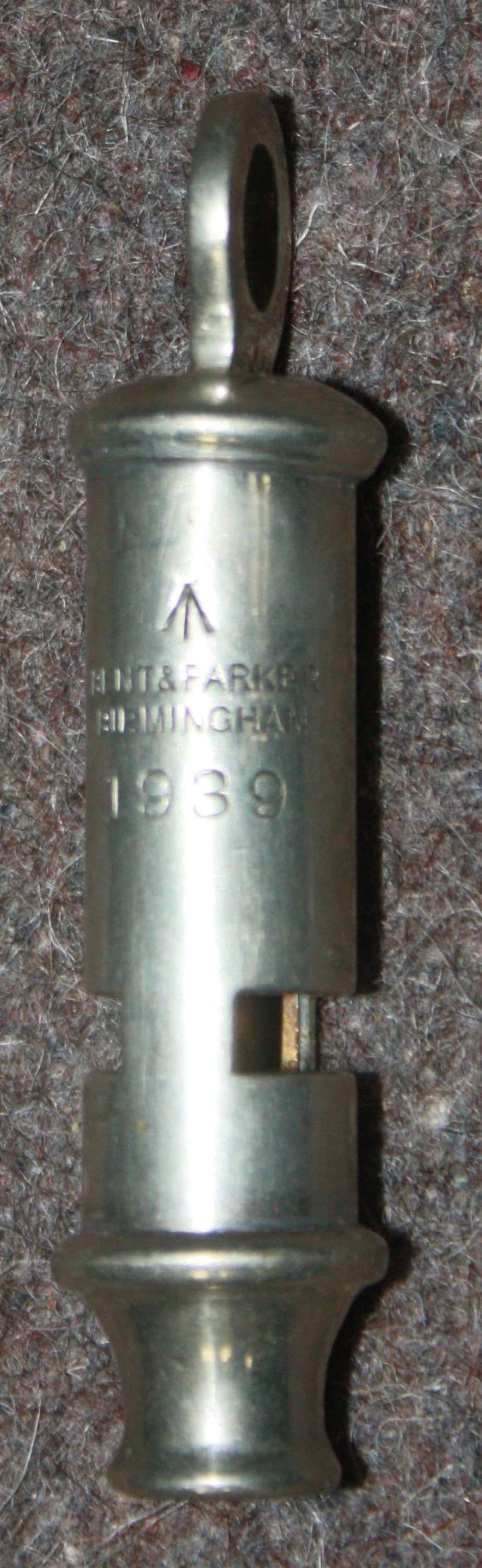 A GOOD SCARCE 1939 DATED BRITISH TUBE WHISTLE