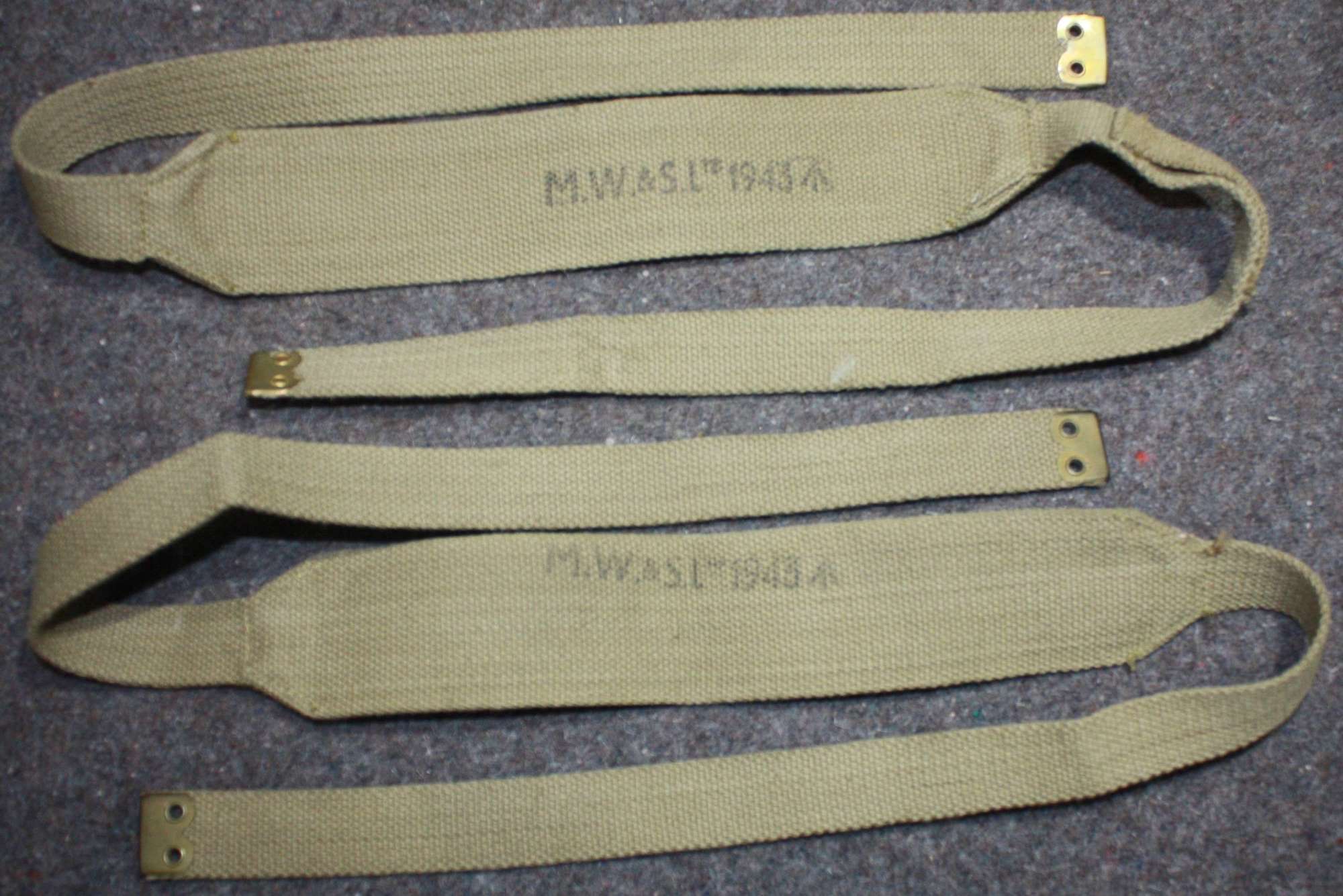 A GOOD MINT PAIR OF 37 PATTERN WEBBING SUSPENDERS MADE BY MWS 1943