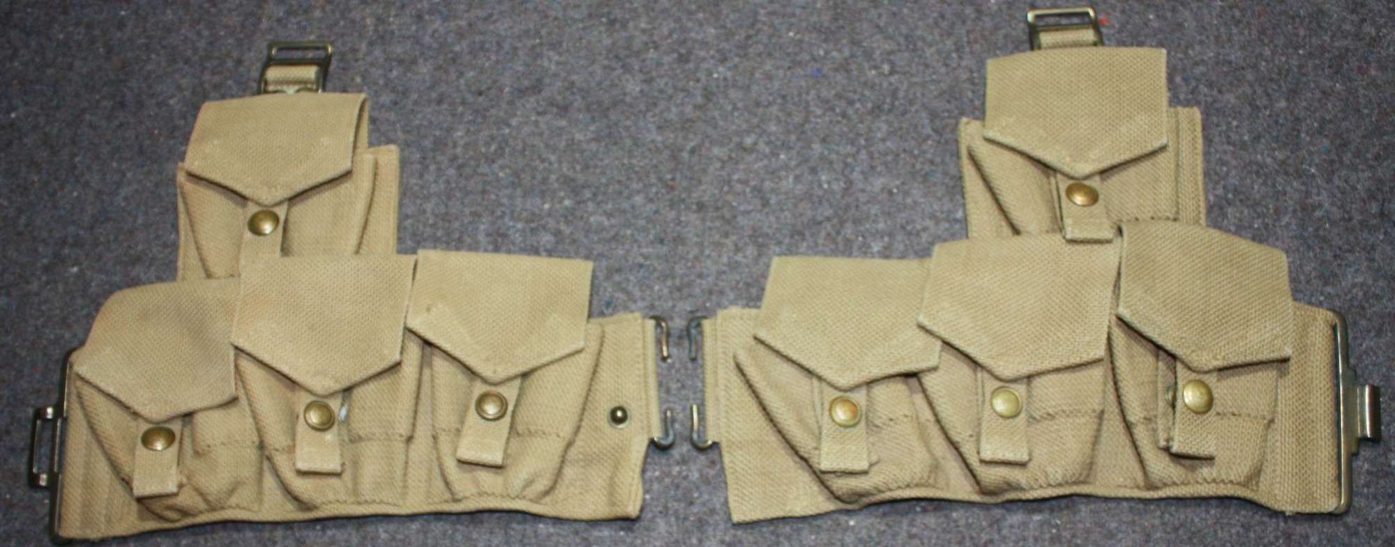 A PAIR OF THE AFGHAN 1927 WEBBING AMMO POUCHES AND REAR BELT SECTION