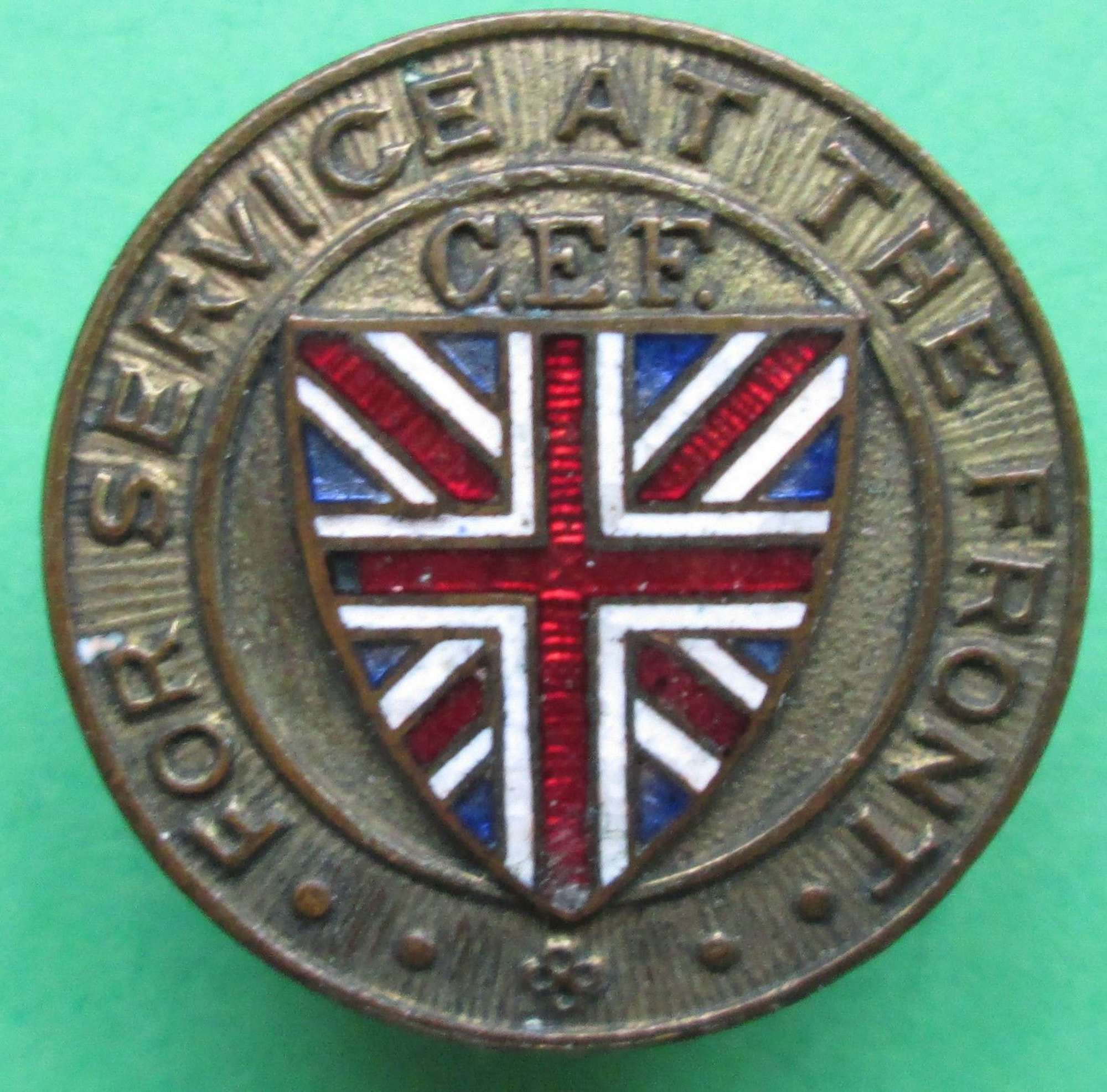 A WWI CANADIAN EXPERDITIONAY FORCE SCREW BACK LAPEL SERVICE BADGE