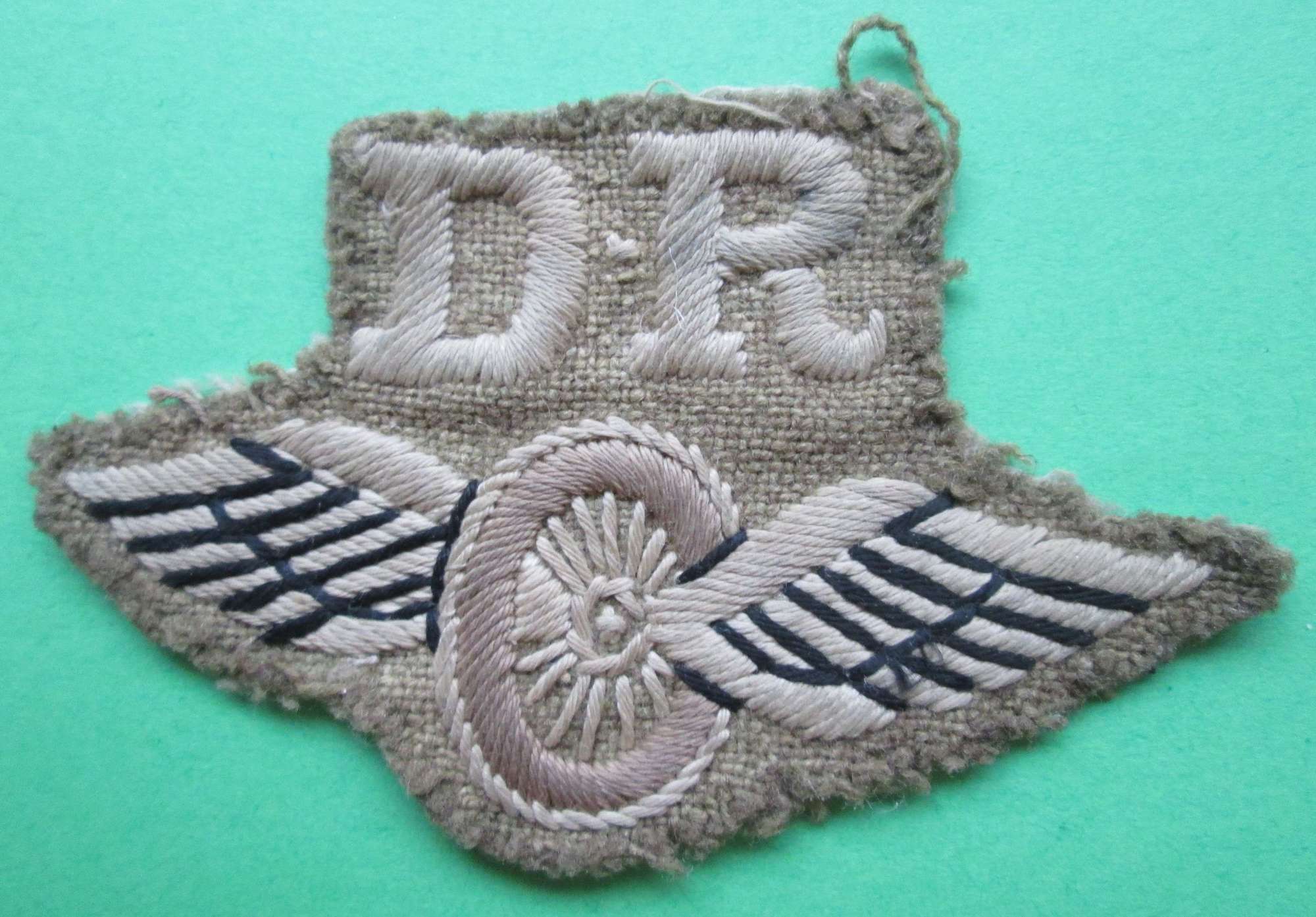 A GOOD USED WWII DISPATCH RIDERS ARM BADGE
