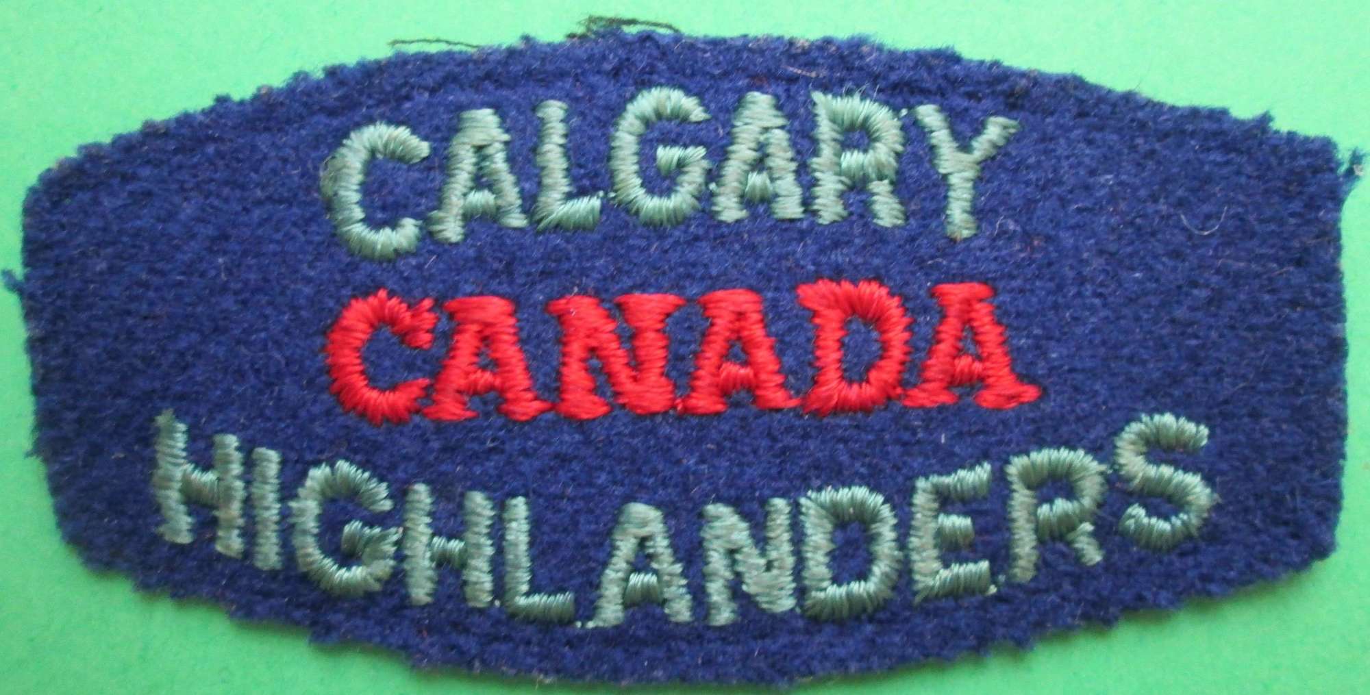 A CALGARY CANADA HIGHLANDERS BADGE
