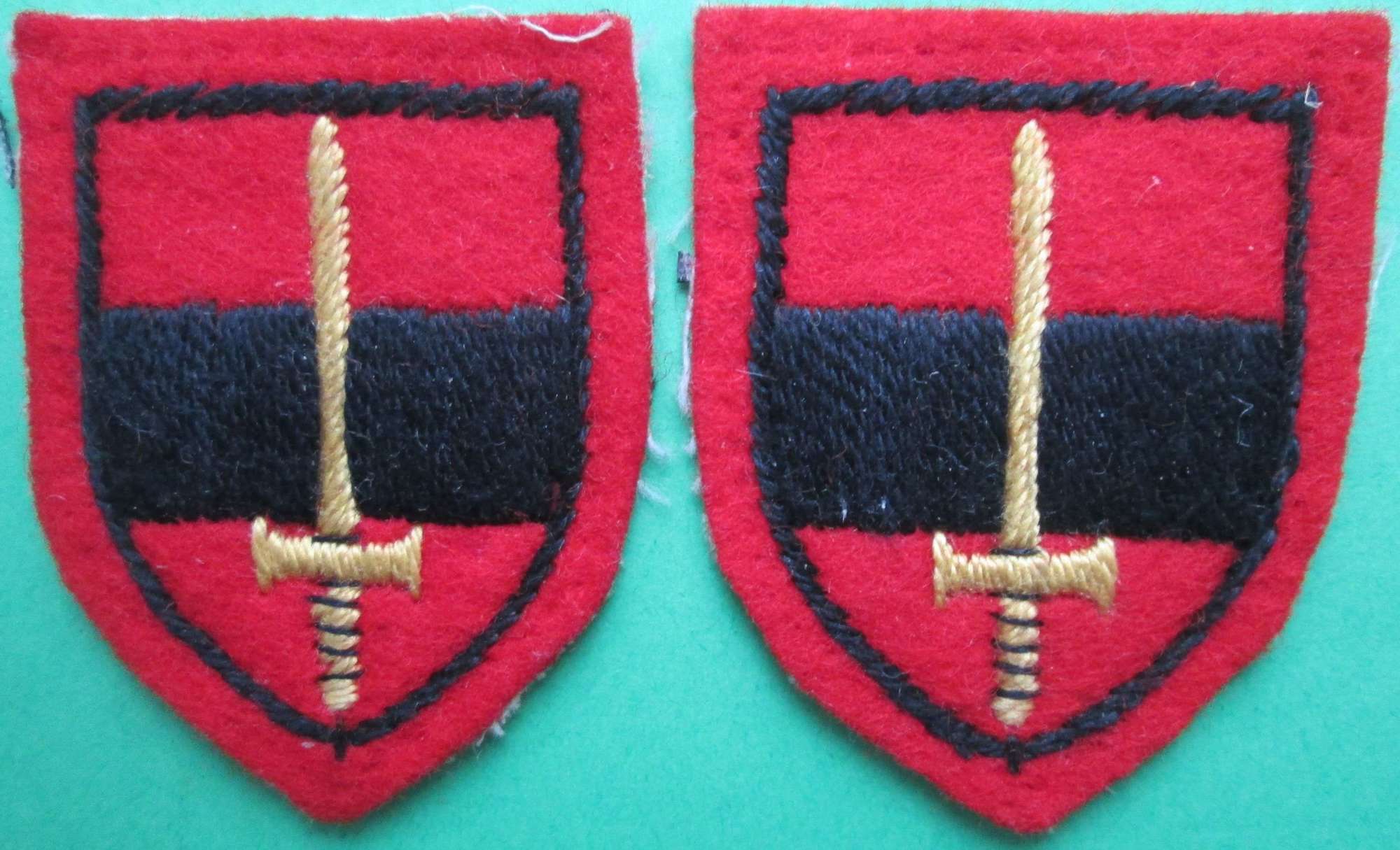 A PAIR OF TERRITORIAL ARMY TROOPS FORMATION SIGNS