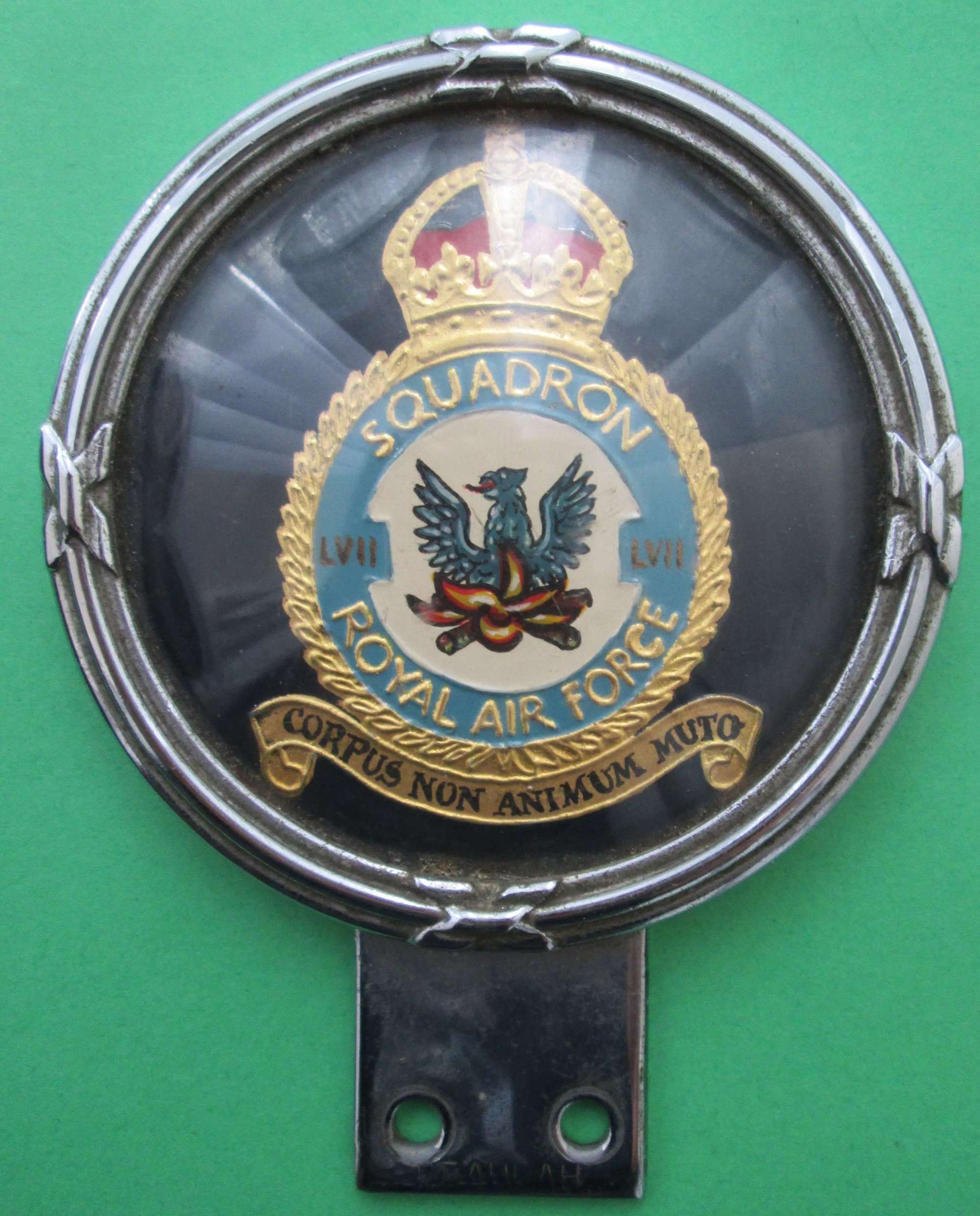 A POST WWII RAF 57 SQUADRON CAR BADGE KINGS CROWN
