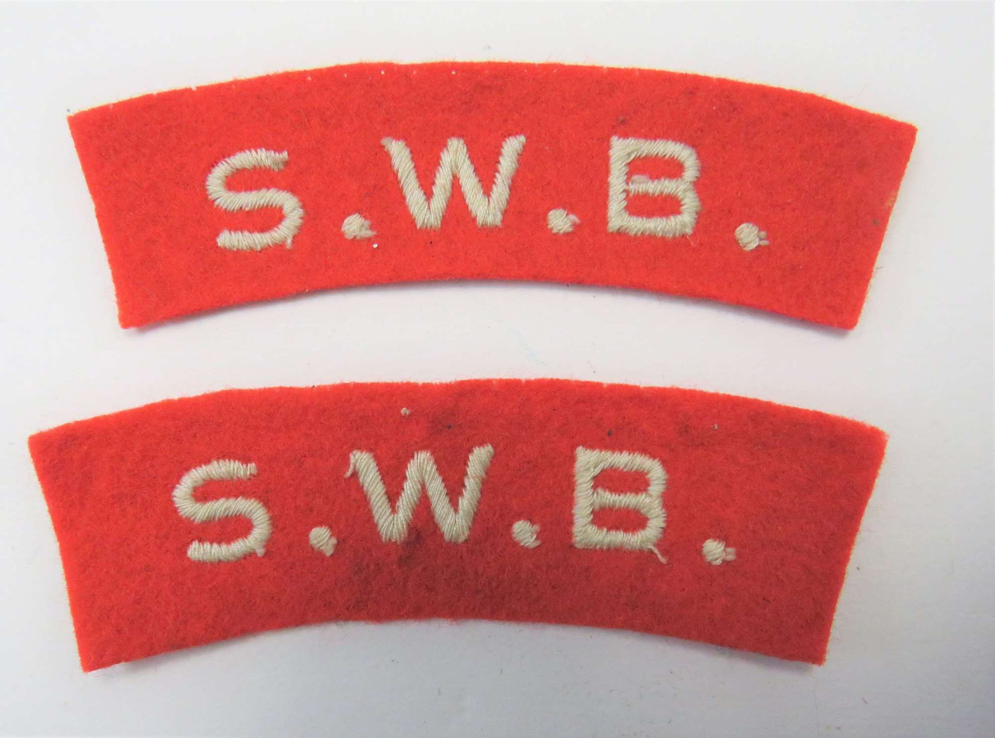 Pair of South Wales Borderers Shoulder Titles
