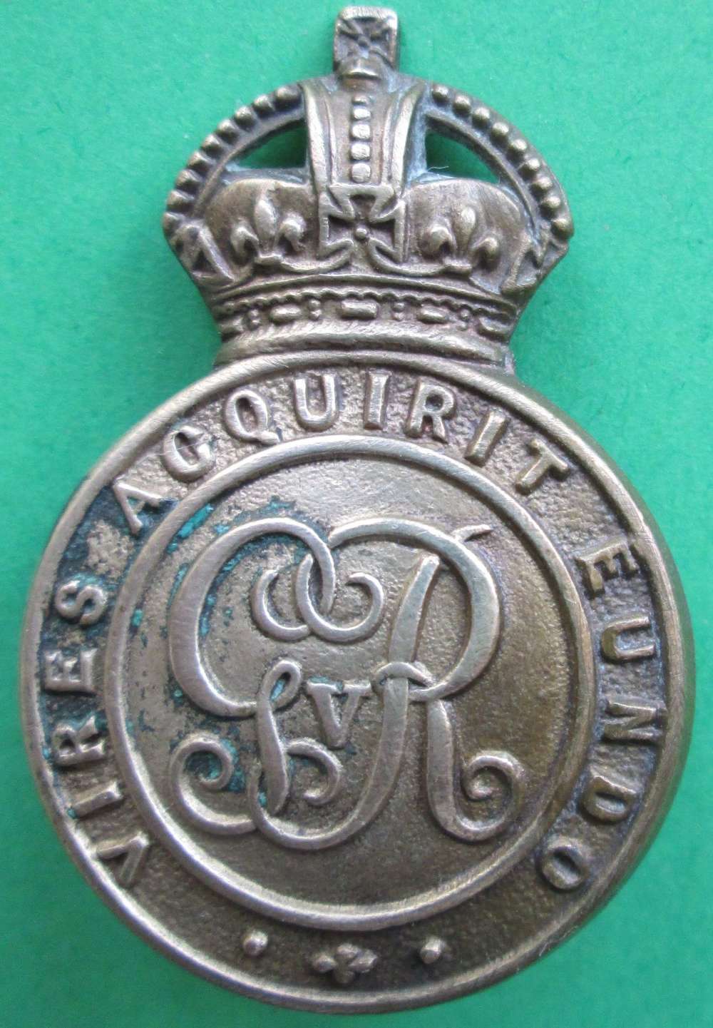 A PRE 1937 ROYAL MILLITARY SCHOOL SANDHURST CAP BADGE