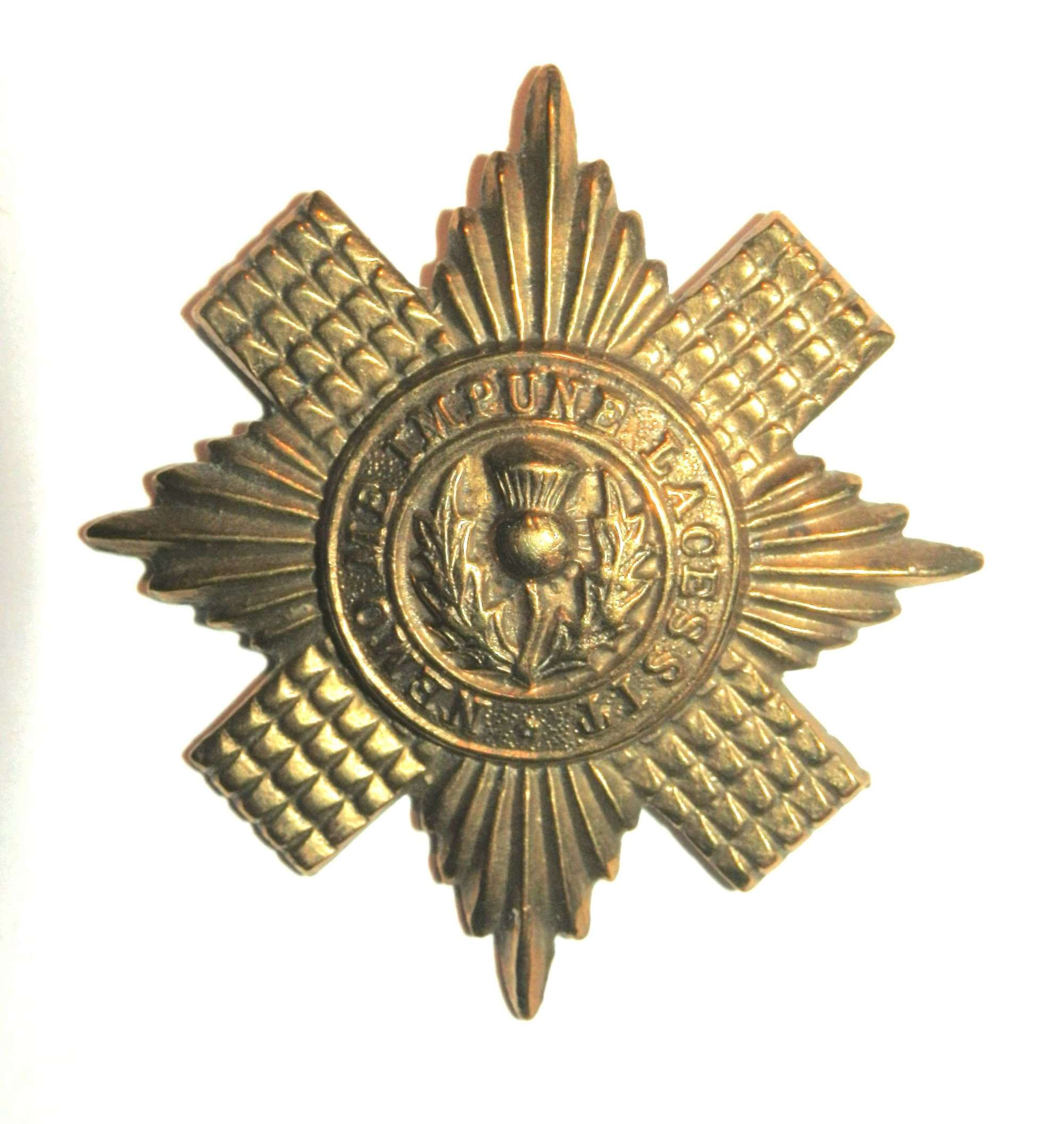 The Scots Guards Cap Badge.