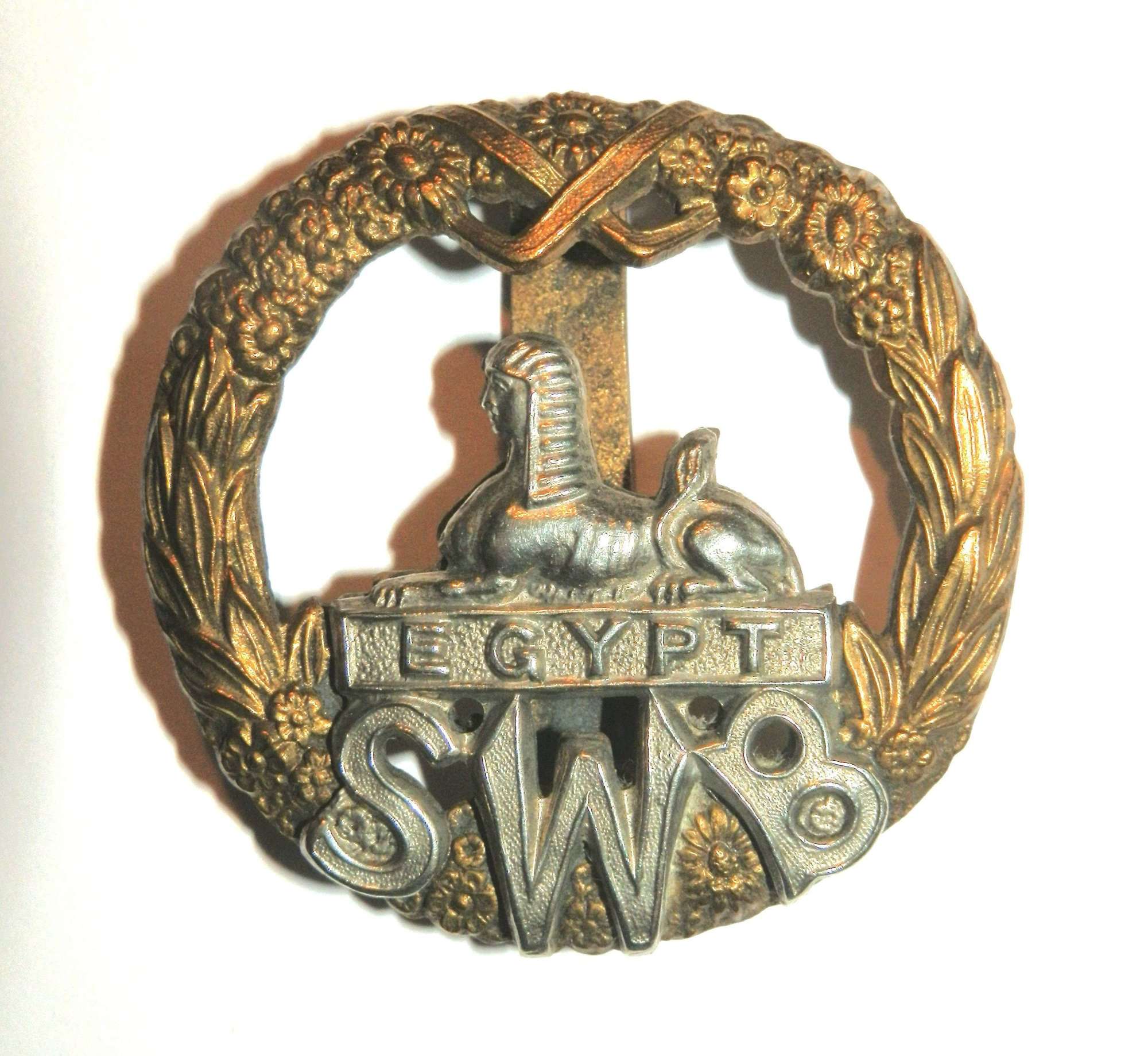 The South Wales Borderers Cap Badge.