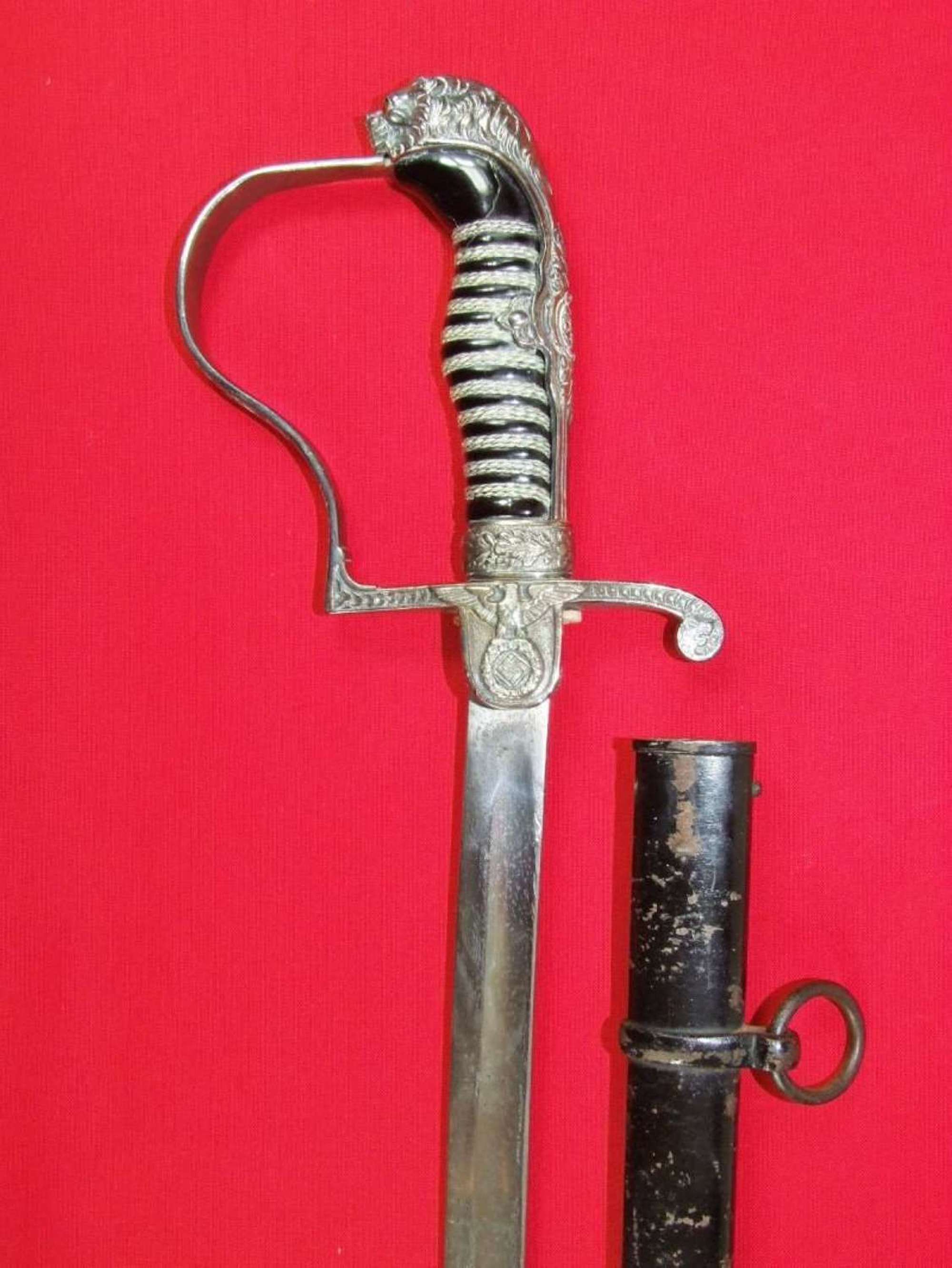 Very Early Silver Lion's Head SS Sword by WKC