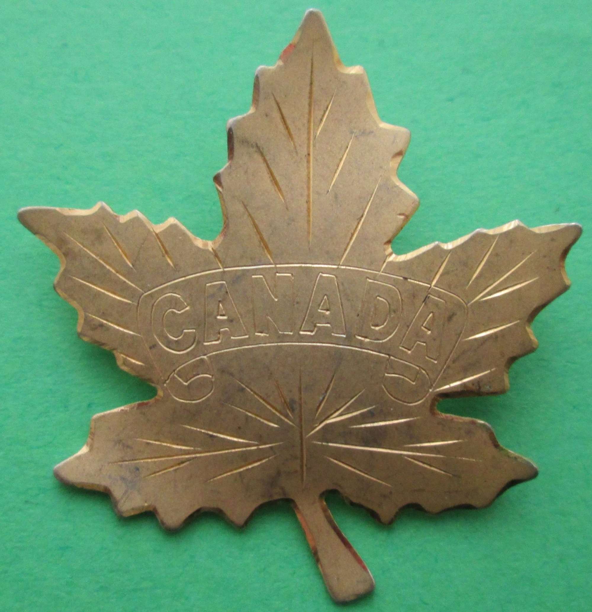 A GOLD PLATED CANADIAN SWEETHEART BROOCH