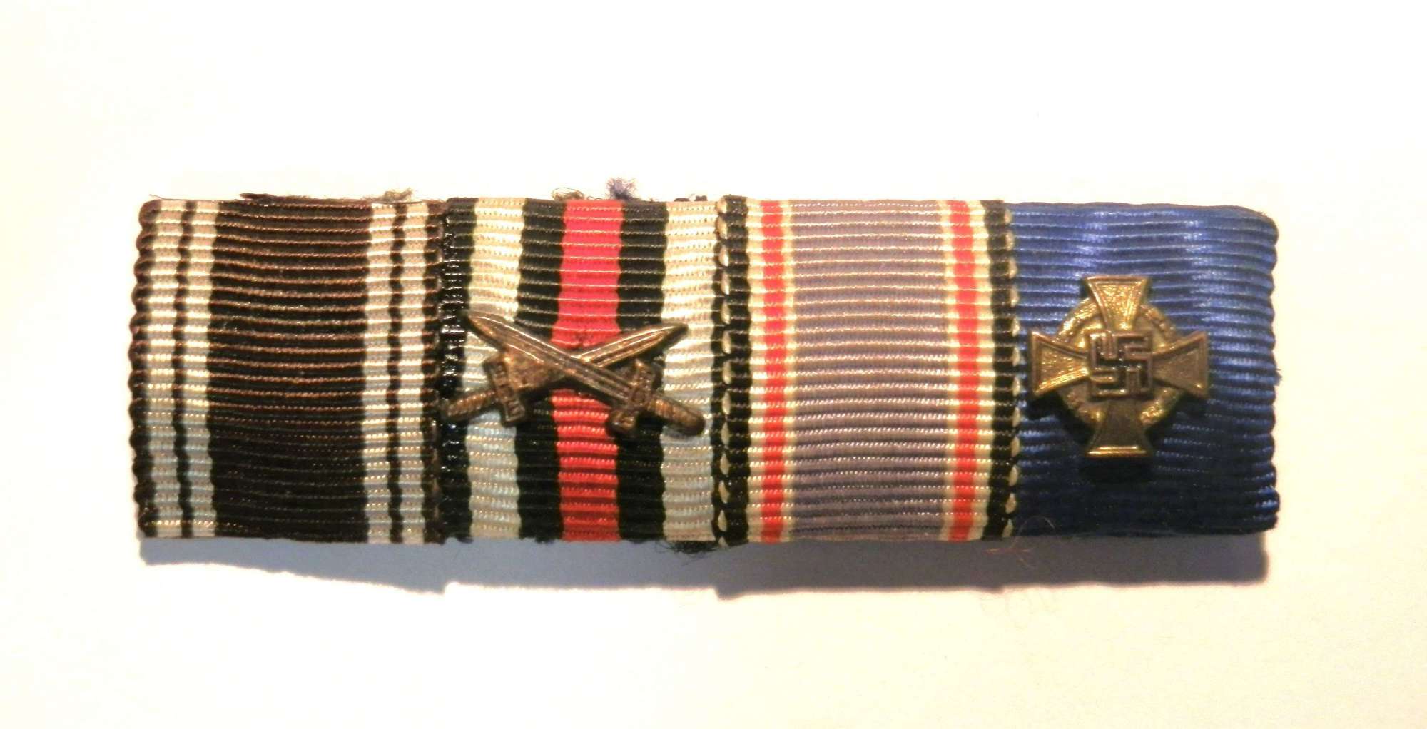NSDAP, Merit Cross, Luftschutz and 40 year Long Service Ribbon Bar.