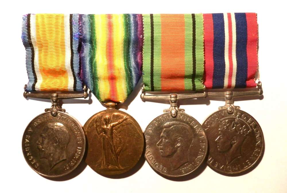 GROUP OF FOUR Commander Laurence Antony Humphries, Royal Navy.