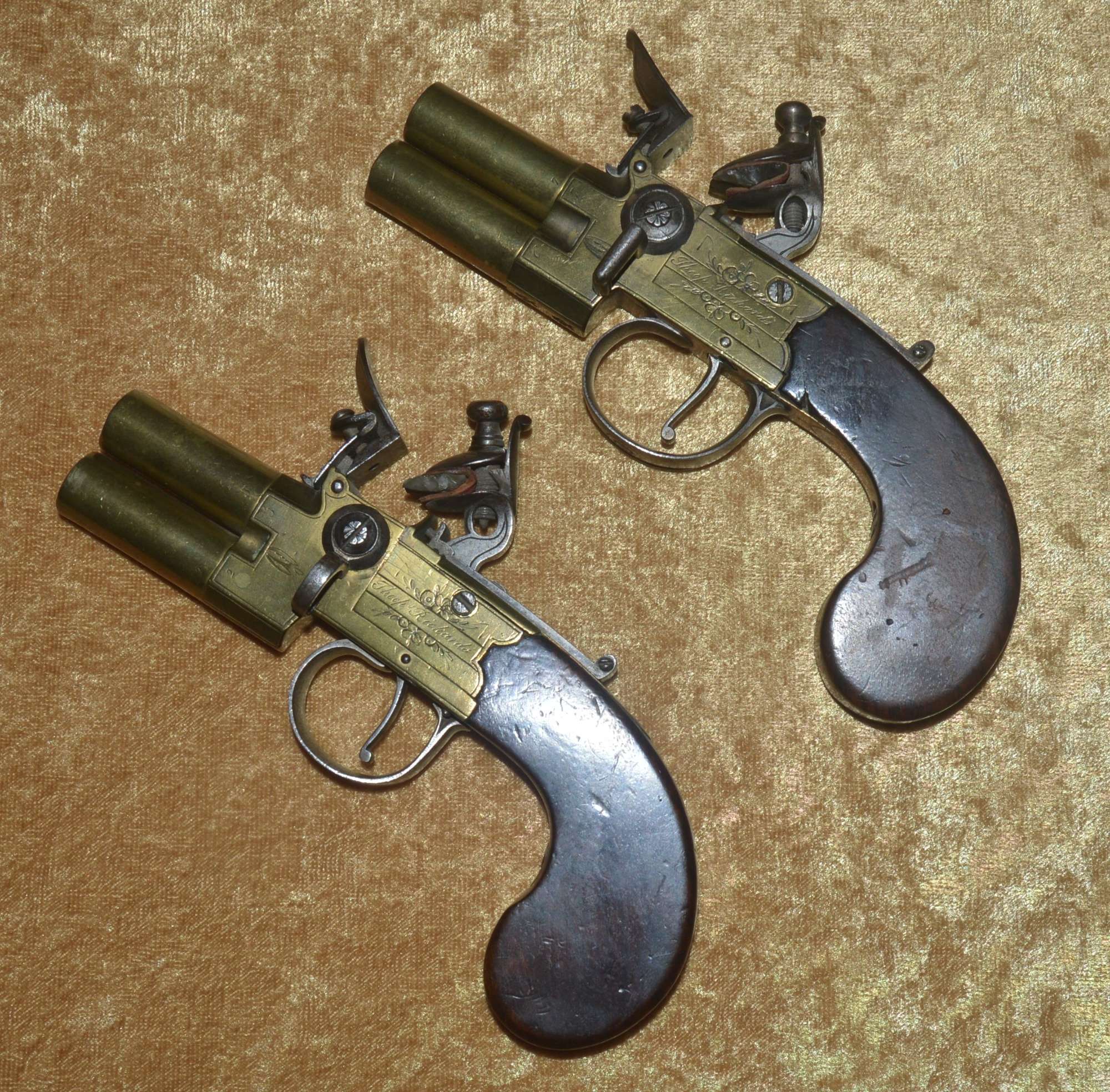 ﻿Fine Pair of Brass Frame Over and Under Tap Action Flintlock Pistol