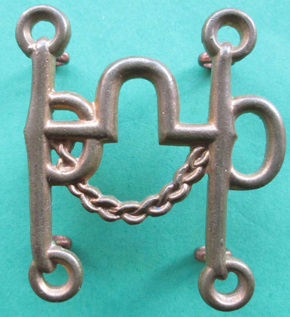 A HORSE BIT TRADE BADGE