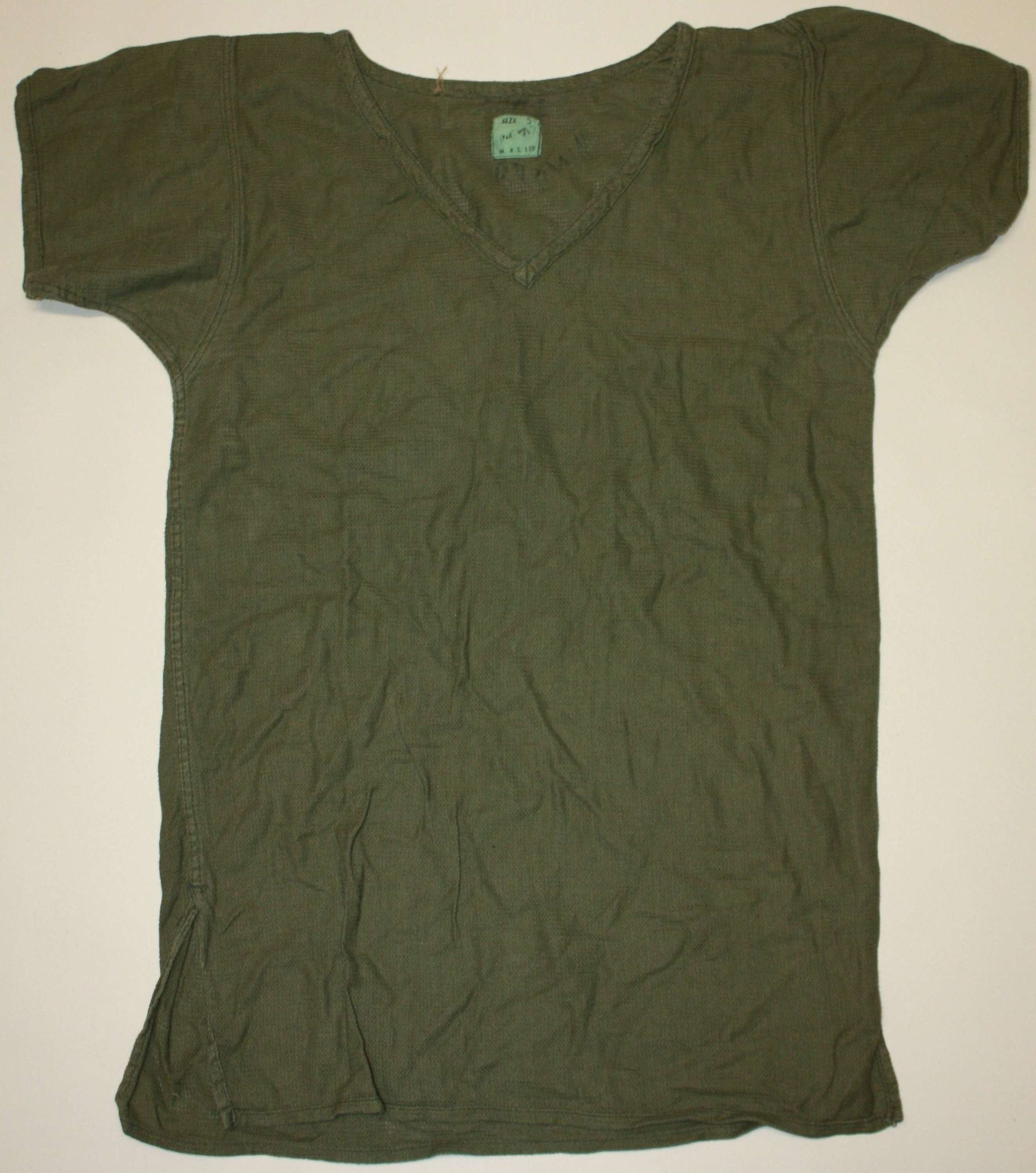 A GOOD 1960'S GREEN ARMY TROPICAL VEST