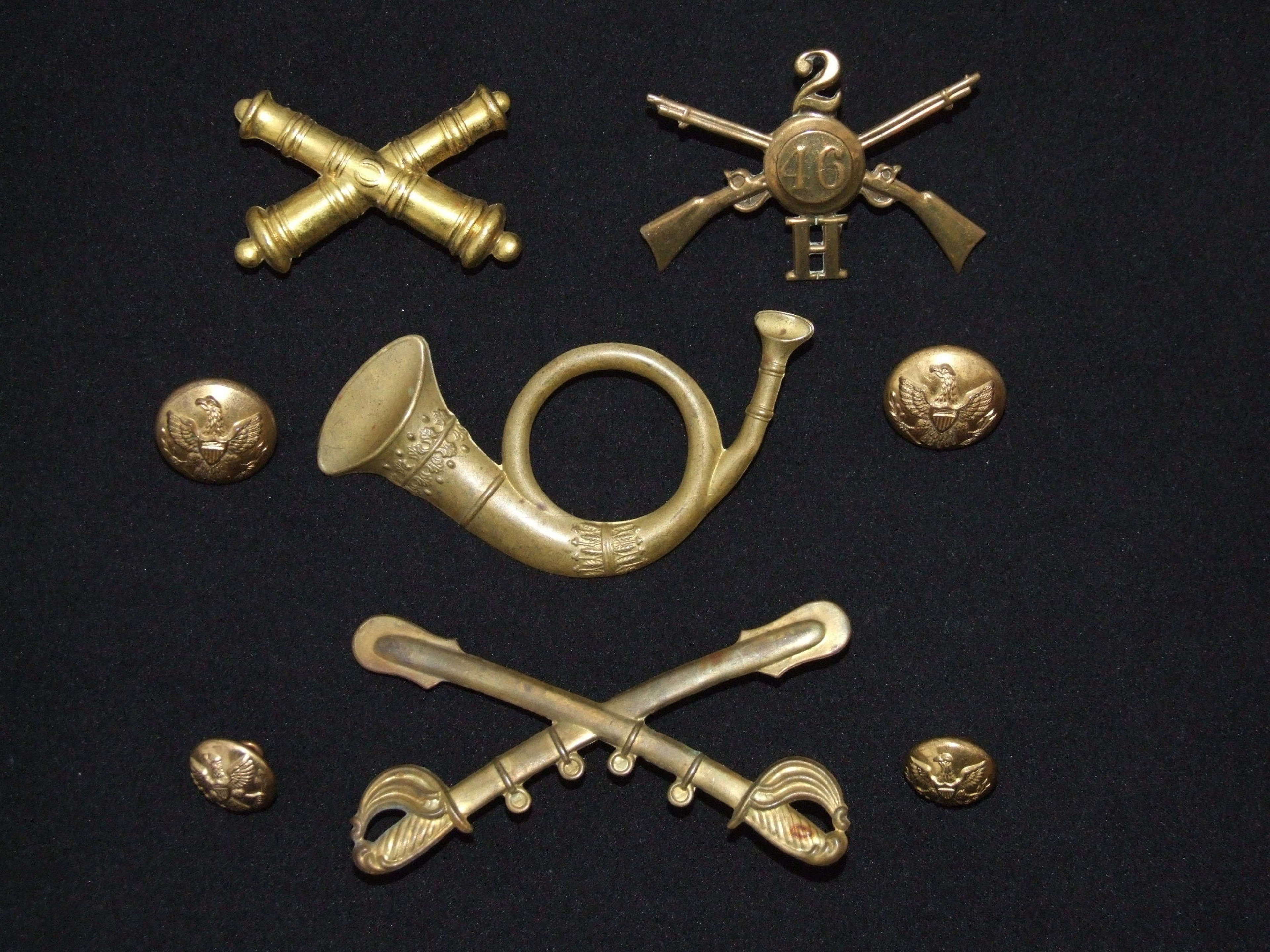 A Collection of Civil War and Later US Headdress badges & Buttons