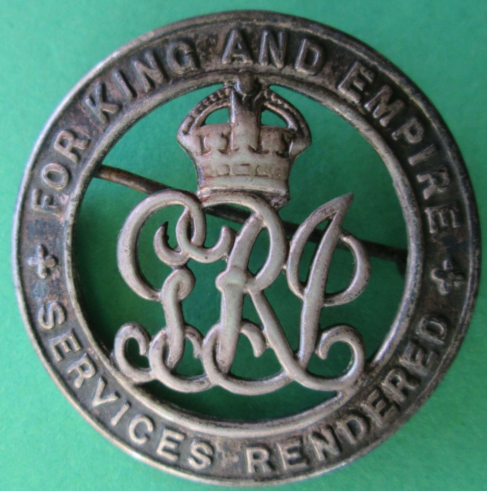 A silver WWI period wound badge