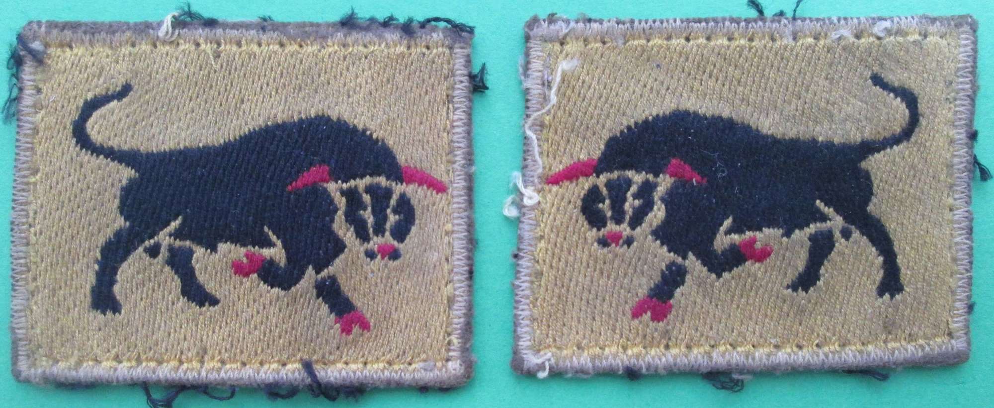 A facing pair of 11th armoured corps formation signs