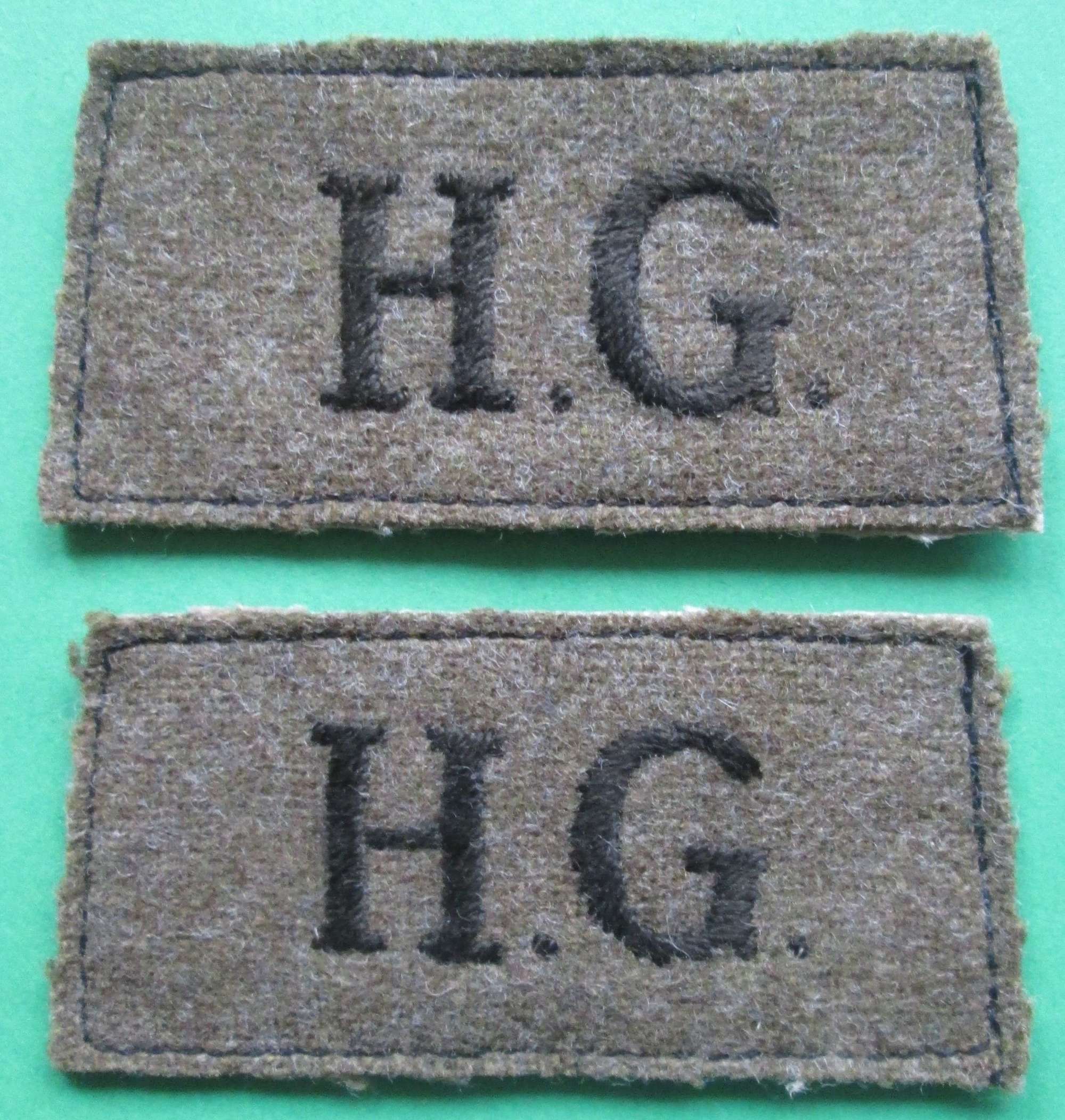 A  PAIR OF HOME GUARD SLIP ON SHOULDER TITLES