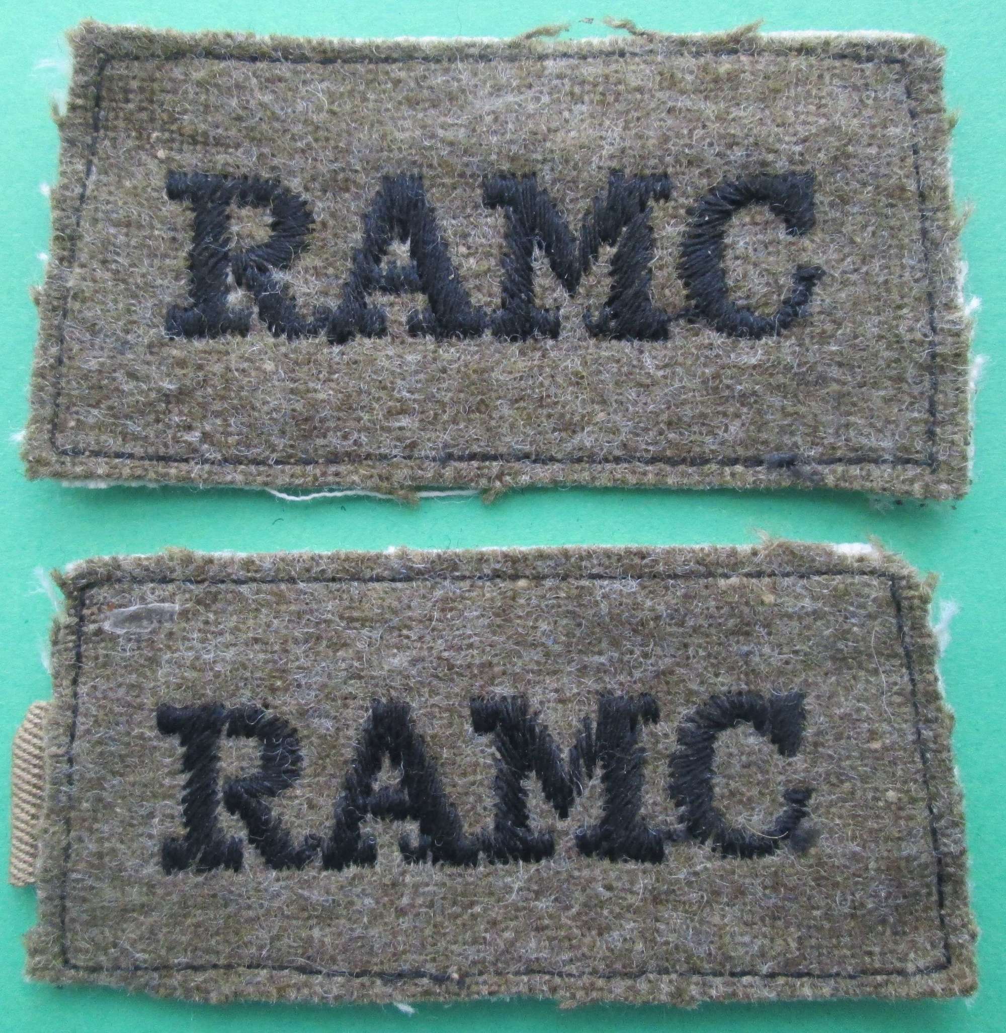A PAIR OF ROYAL ARMY MEDICAL CORPS SLIP ON SHOULDER TITLES