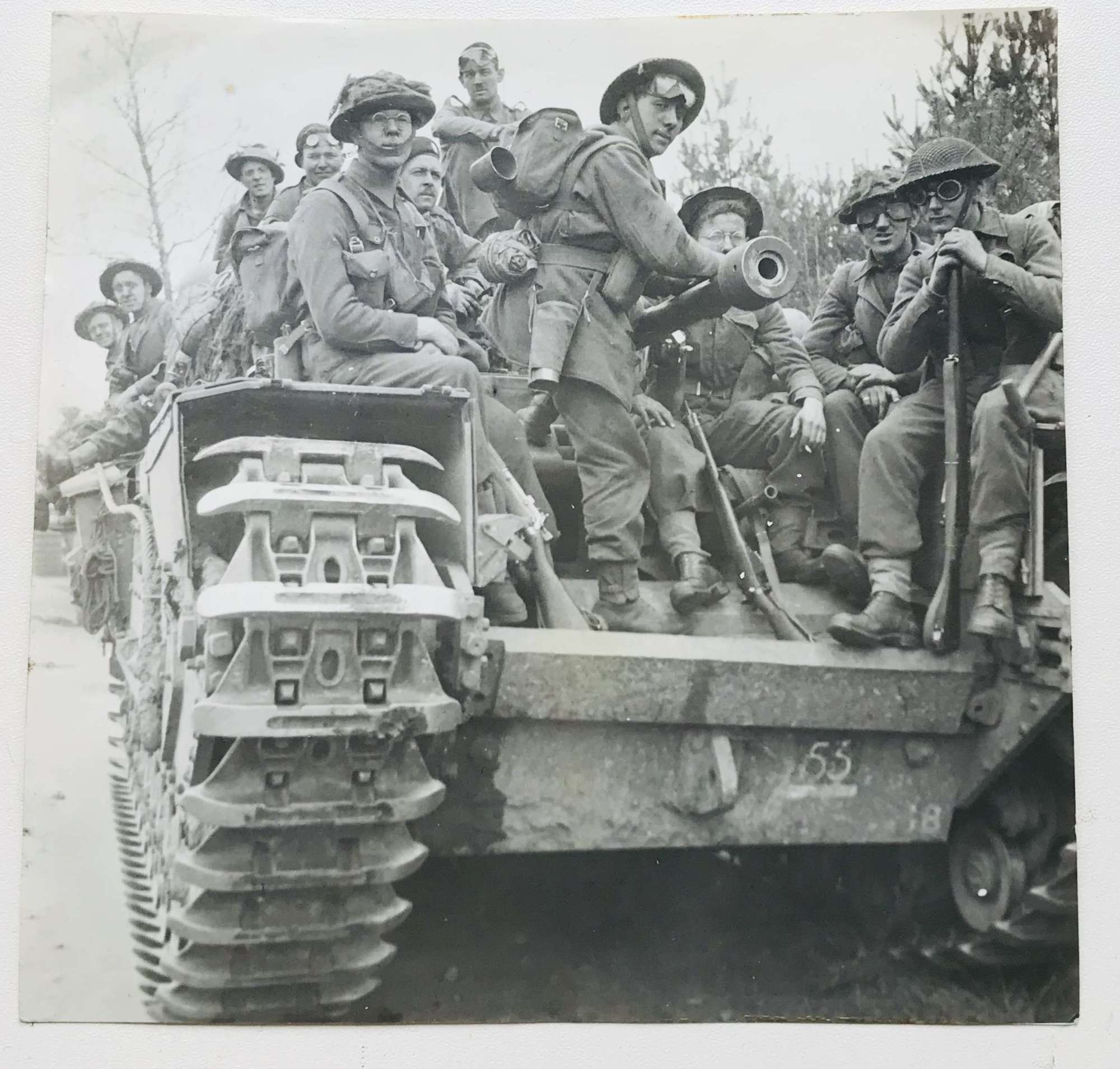 Press photo of British infantry and Churchill Tank