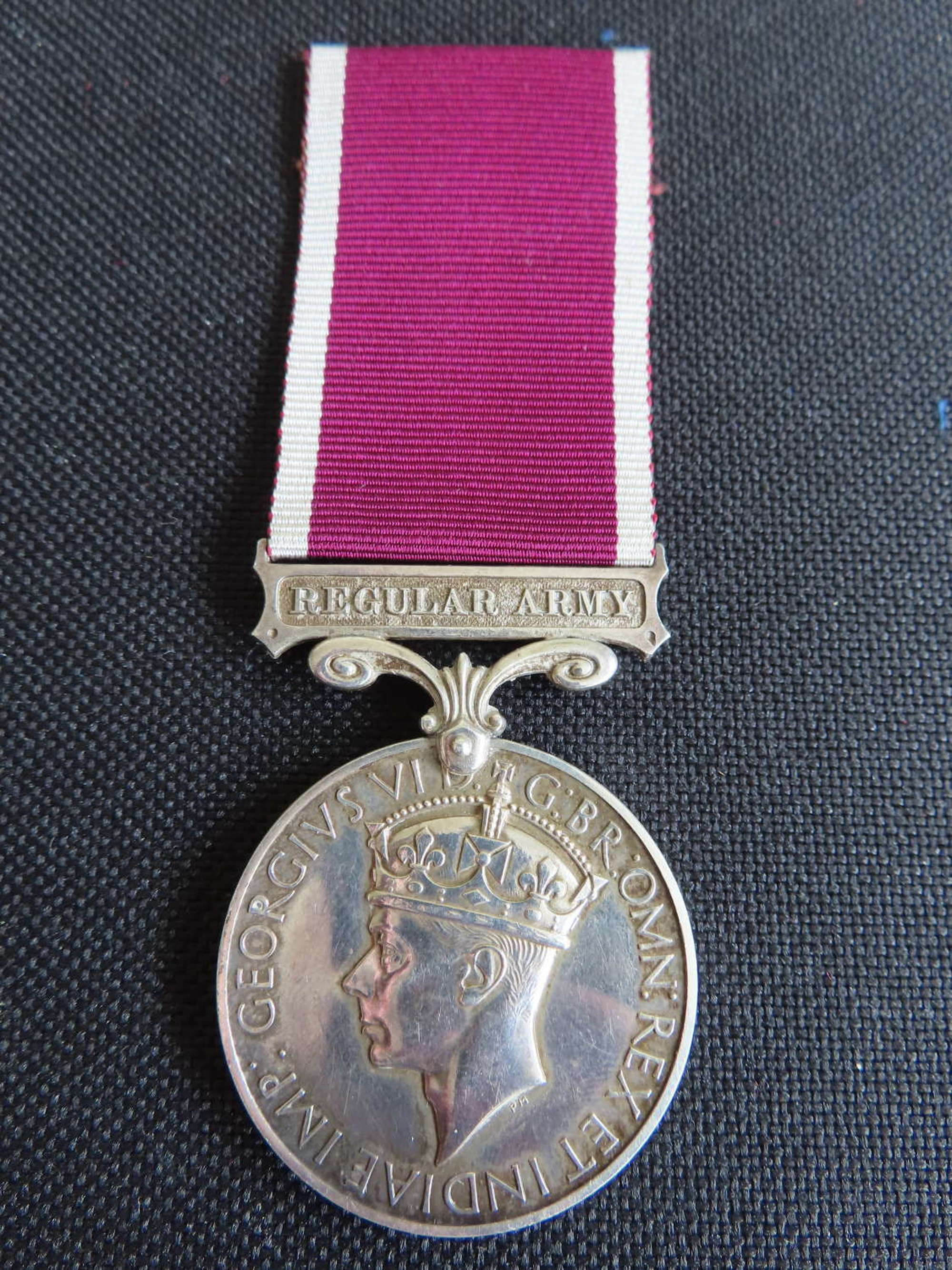Long service good conduct medal awarded to Cpl Acteson R.E.