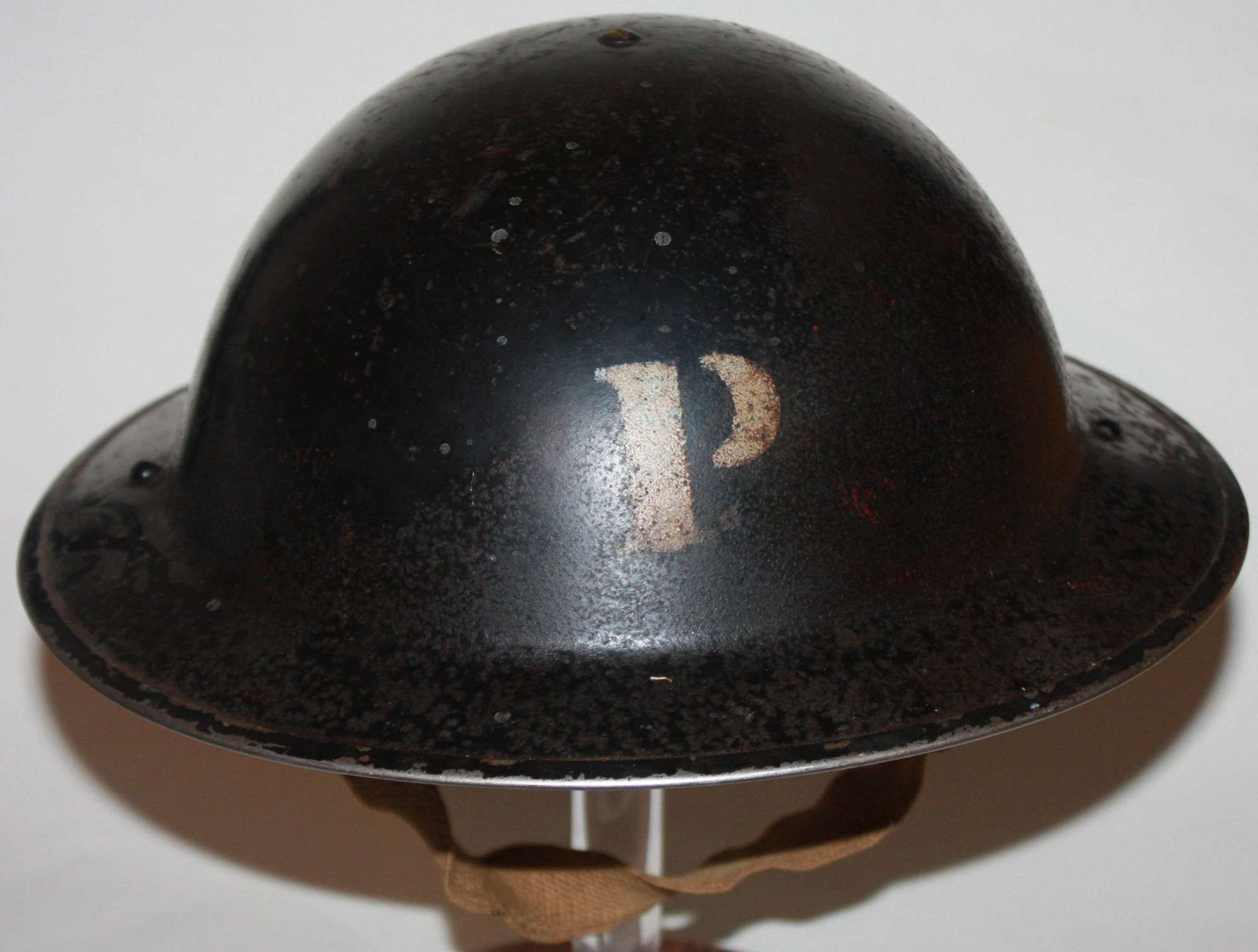 A RARE EXAMPLE OF A CIVIL DEFENCE P MARKED HELMET