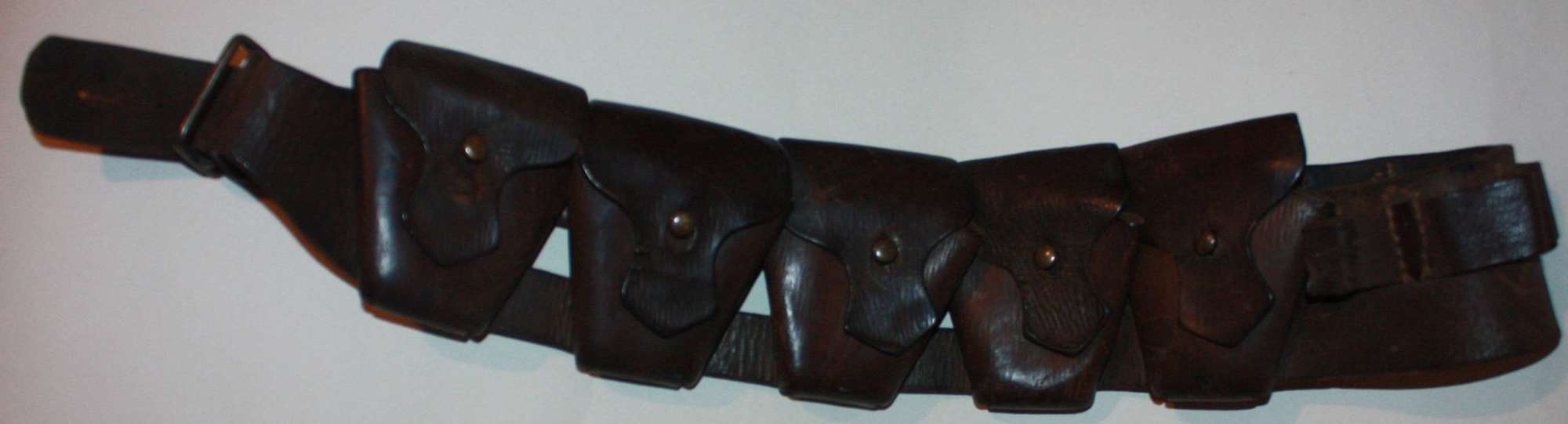 A CONVERTED 03 BANDOLIER  WHICH HAS HAD SHOT GUN LOOPS ADDED TO IT