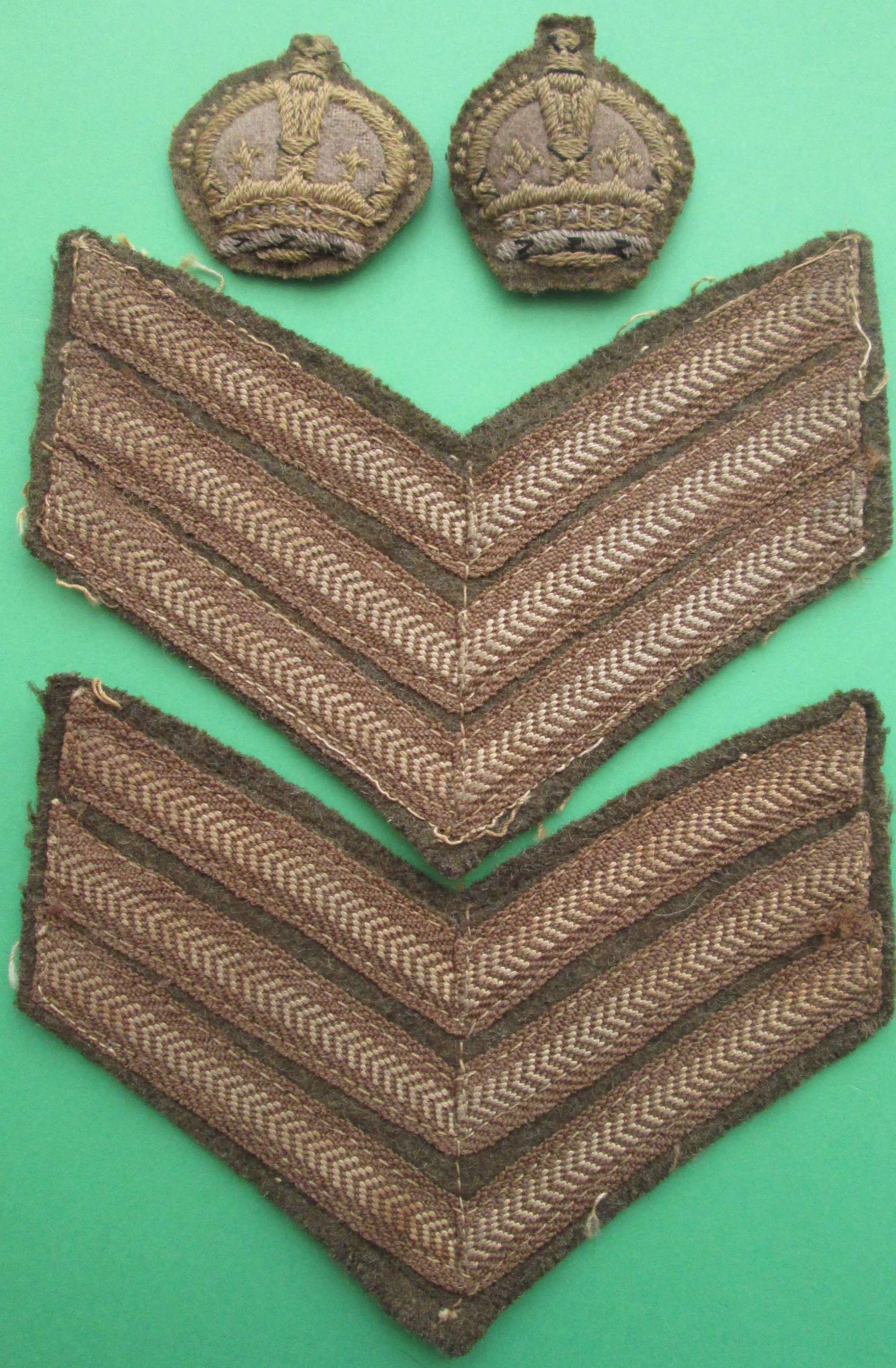 A WWII PERIOD PAIR  OF SGTS STRIPES AND CROWNS