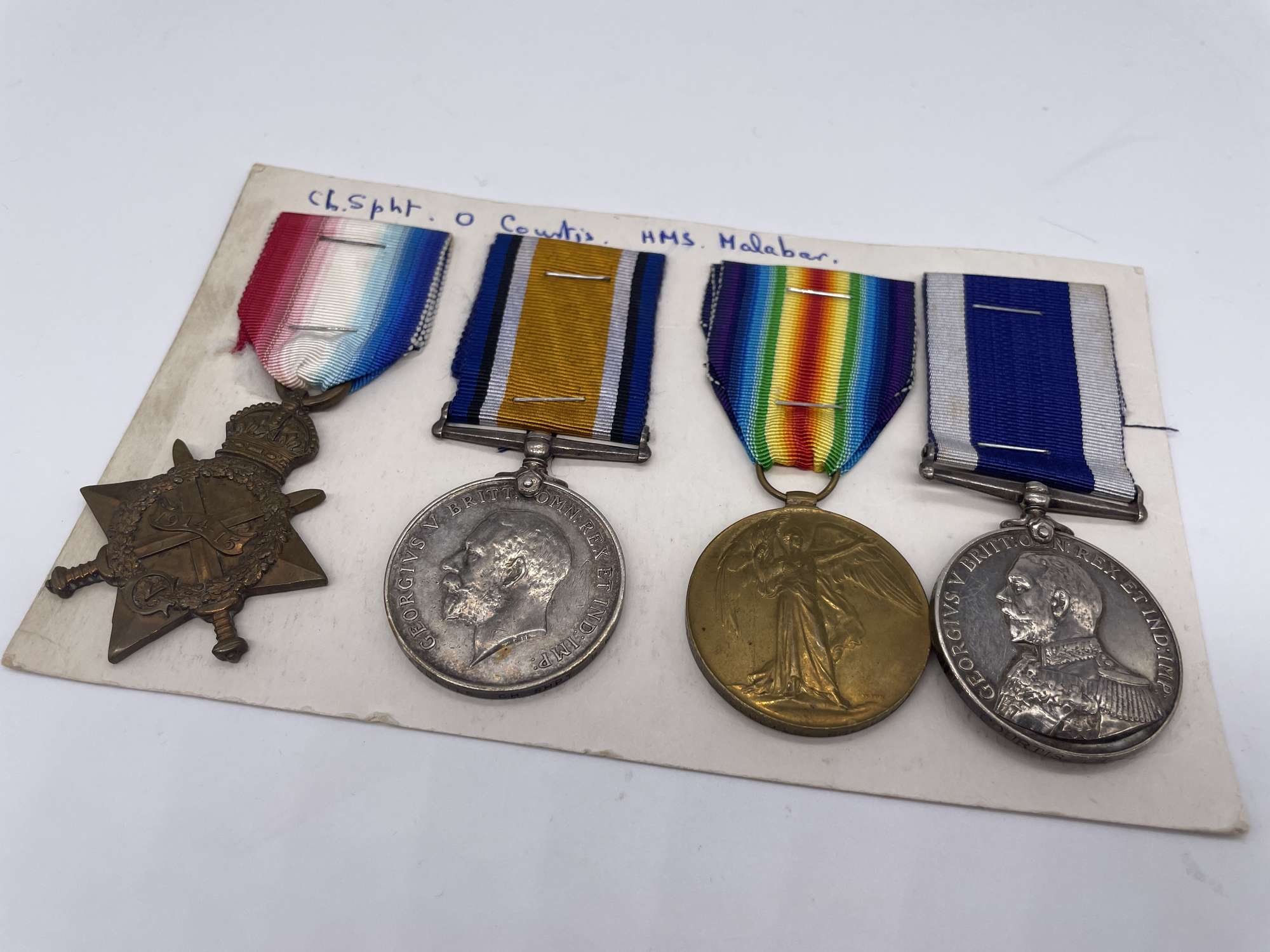 Original World War One Medal Trio and Navy LSGC, Chief Shipwright Courtis, HMS Malabar