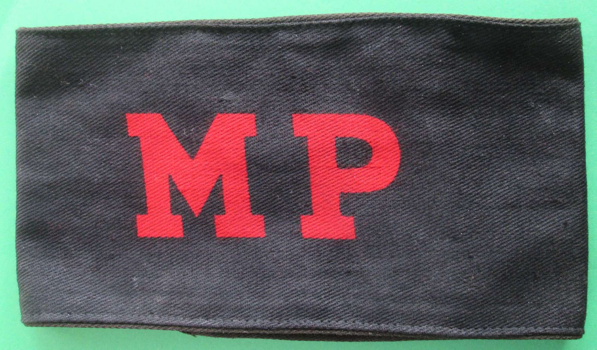 A GOOD WWII PERIOD MP ARM BAND
