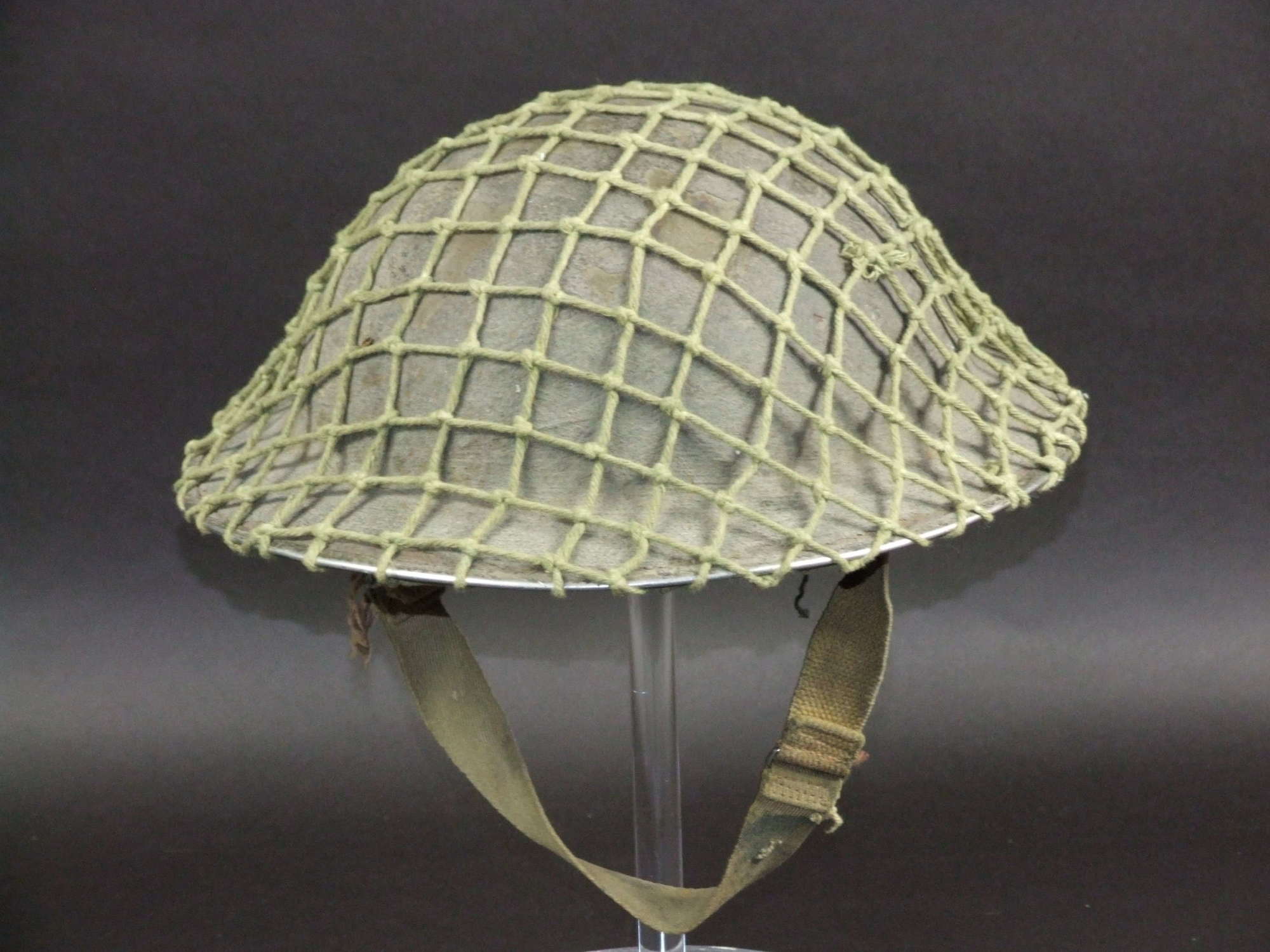 1942 Dated Mk11 Brodie Helmet with Heavy Camouflage & Net