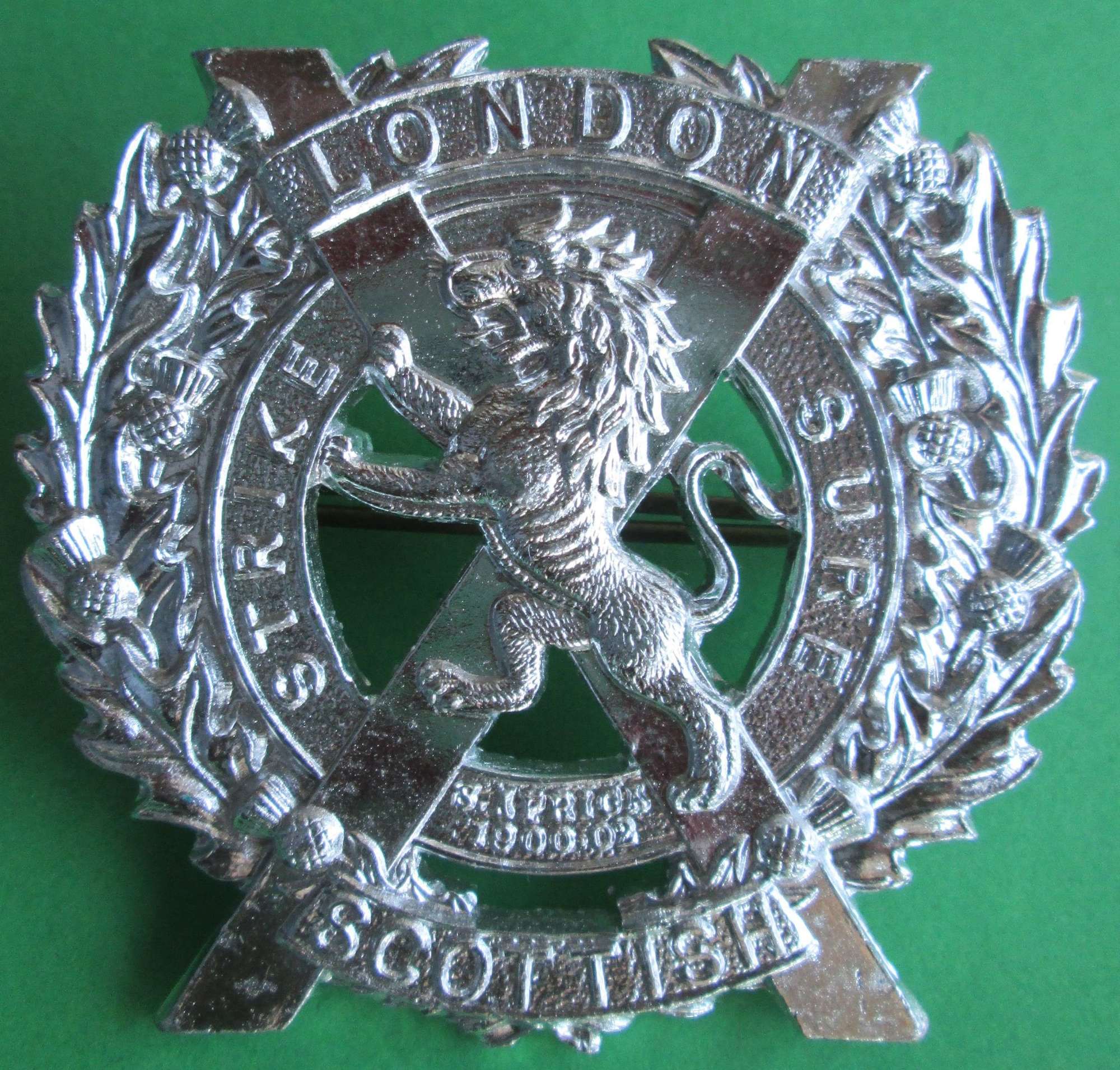AN ANODISED METAL 14TH LONDON REGIMENT BADGE