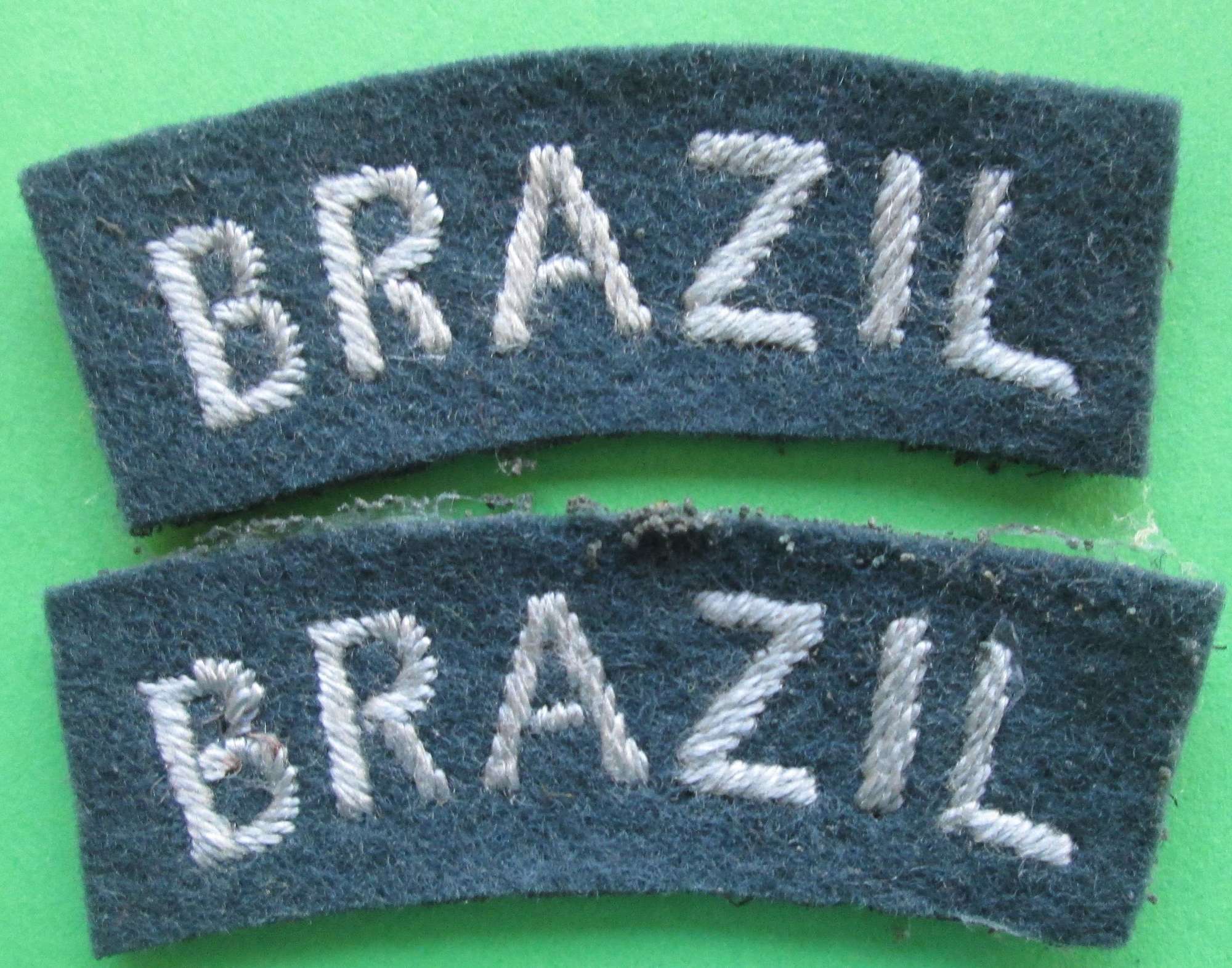 A PAIR OF WWII BRAZIL RAF SHOULDER TITLES