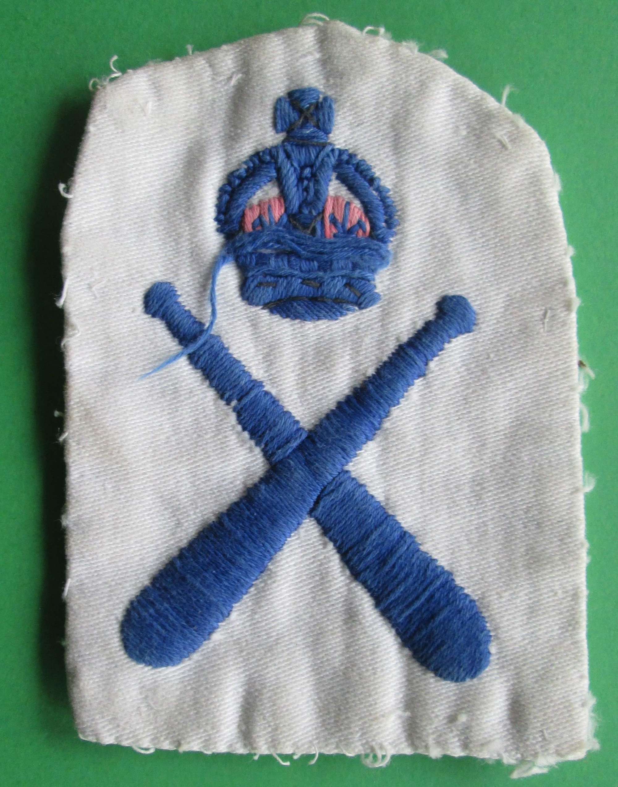 A WWII PERIOD ROYAL NAVY PHYSICAL TRAINING INSTRUCTORS ARM BADGE