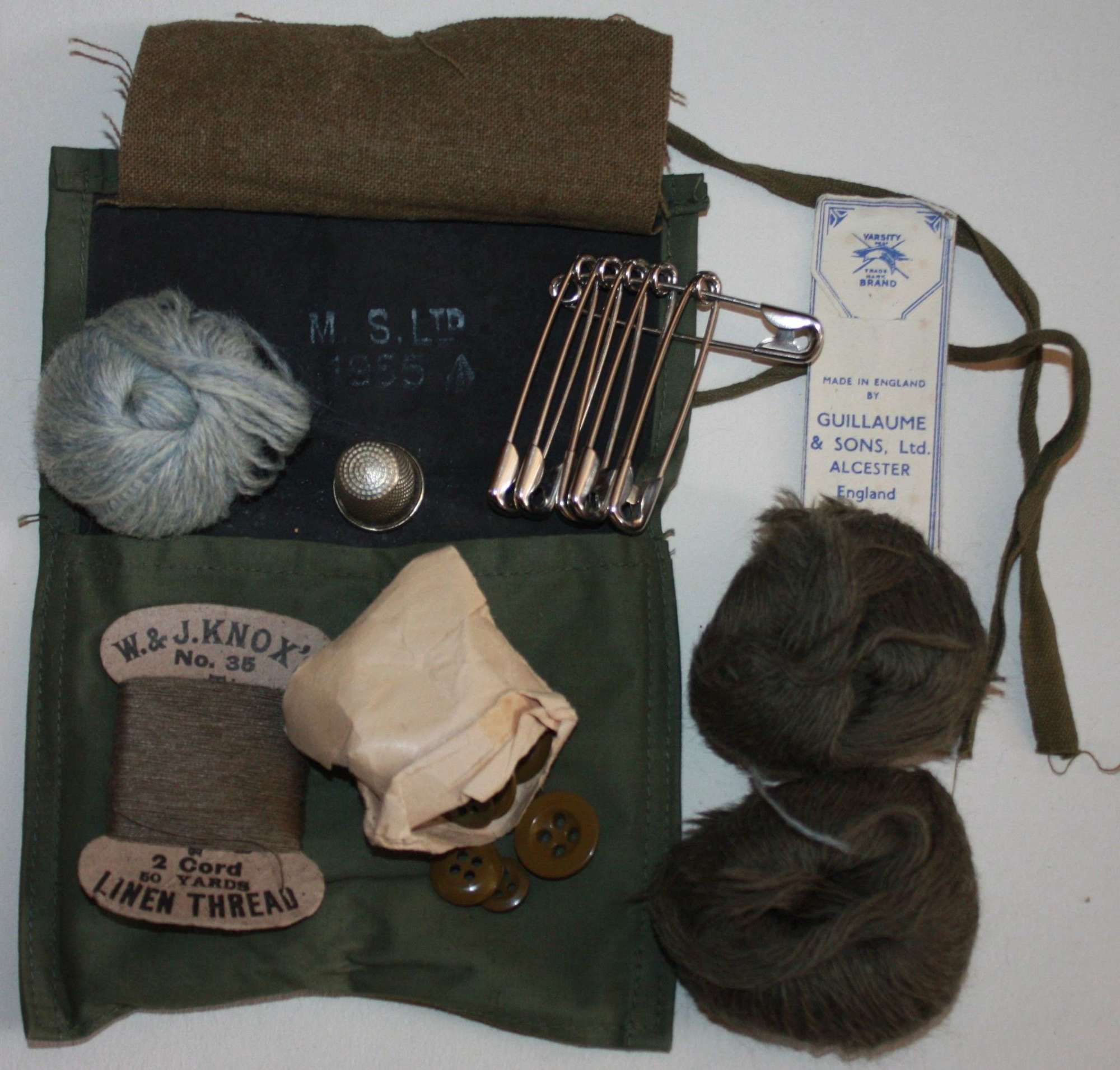 A 1955 DATED ARMY HOUSE WIFE SOWING KIT