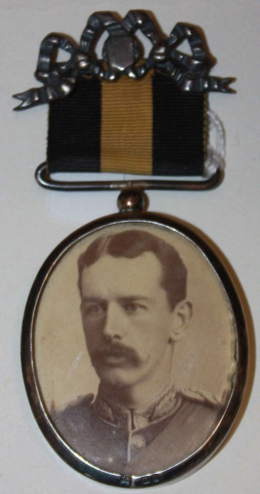 A LATE VICTORIAN PERIOD SILVER MOUNTED OFFICERS PICTURE