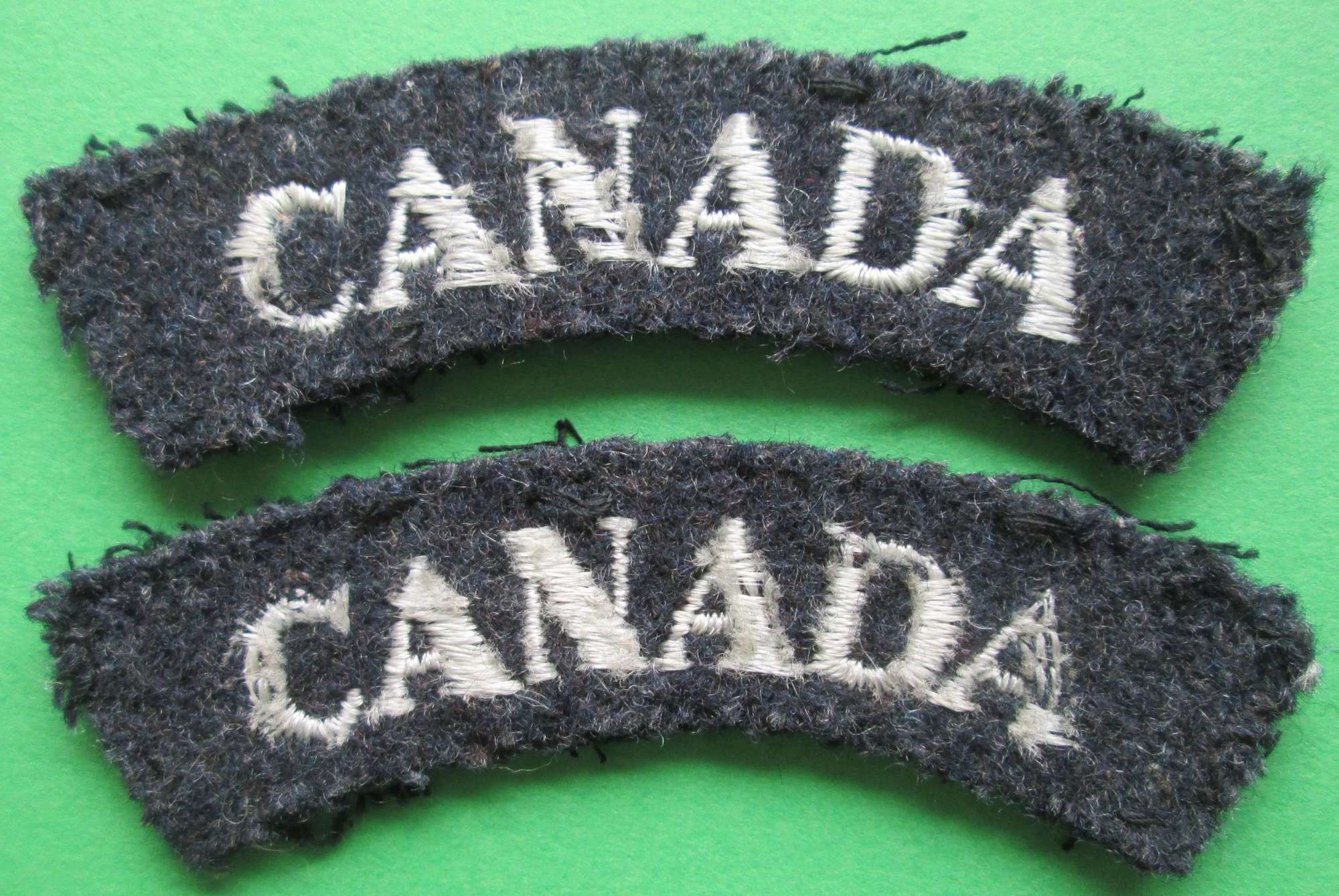 PAIR OF RCAF WOVEN CANADA SHOULDER TITLES