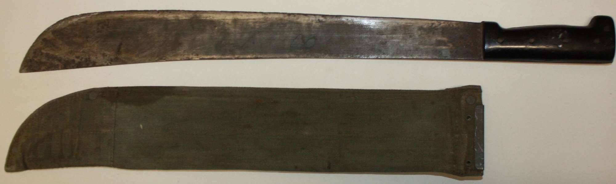 A GOOD CONDITION 1945 DATED 44 PATTERN WEBBING MACHETE  SCABARD