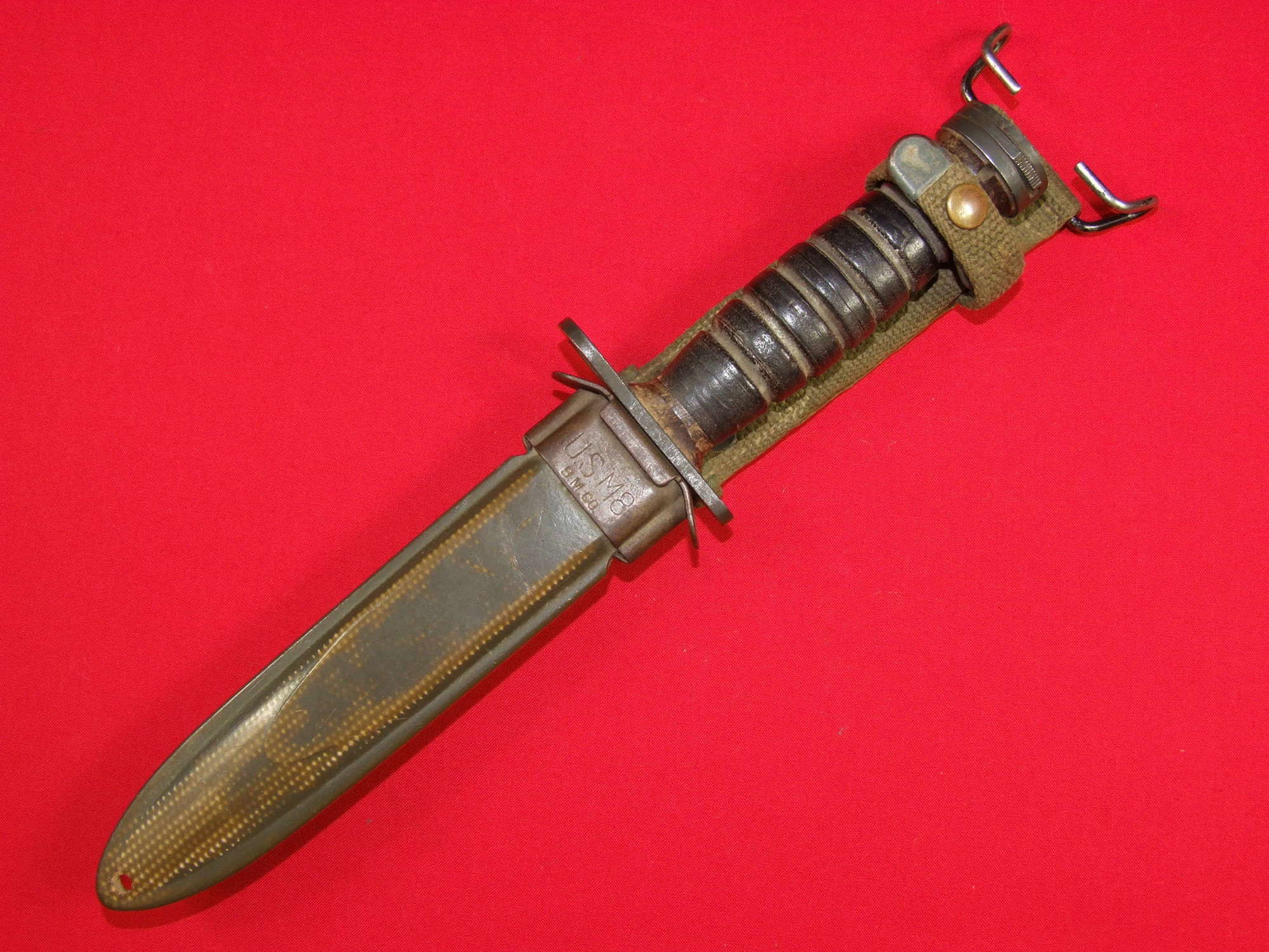US M4 Bayonet for the M1 Carbine. Leather Handle