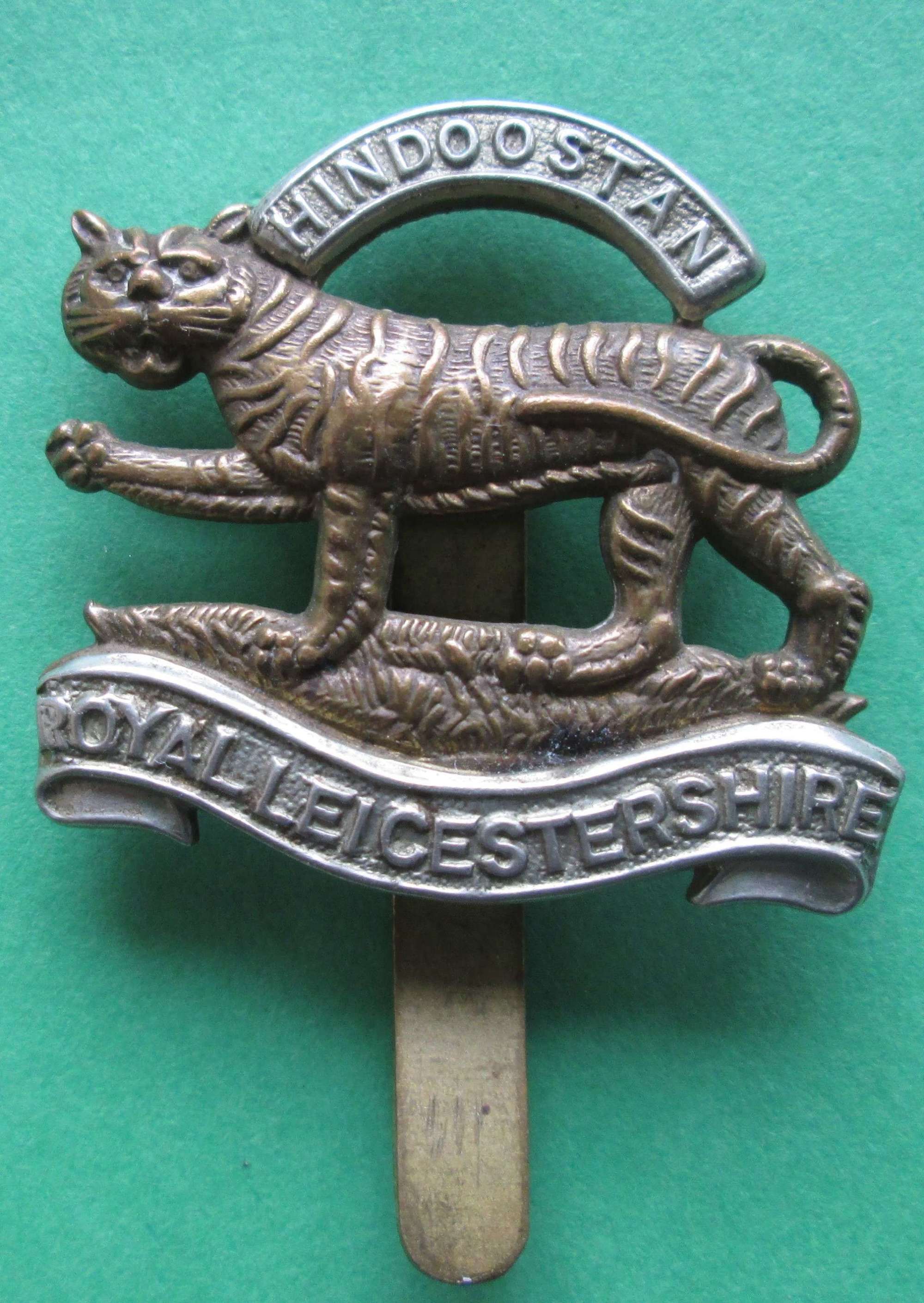 A ROYAL LEICESTERSHIRE CAP BADGE