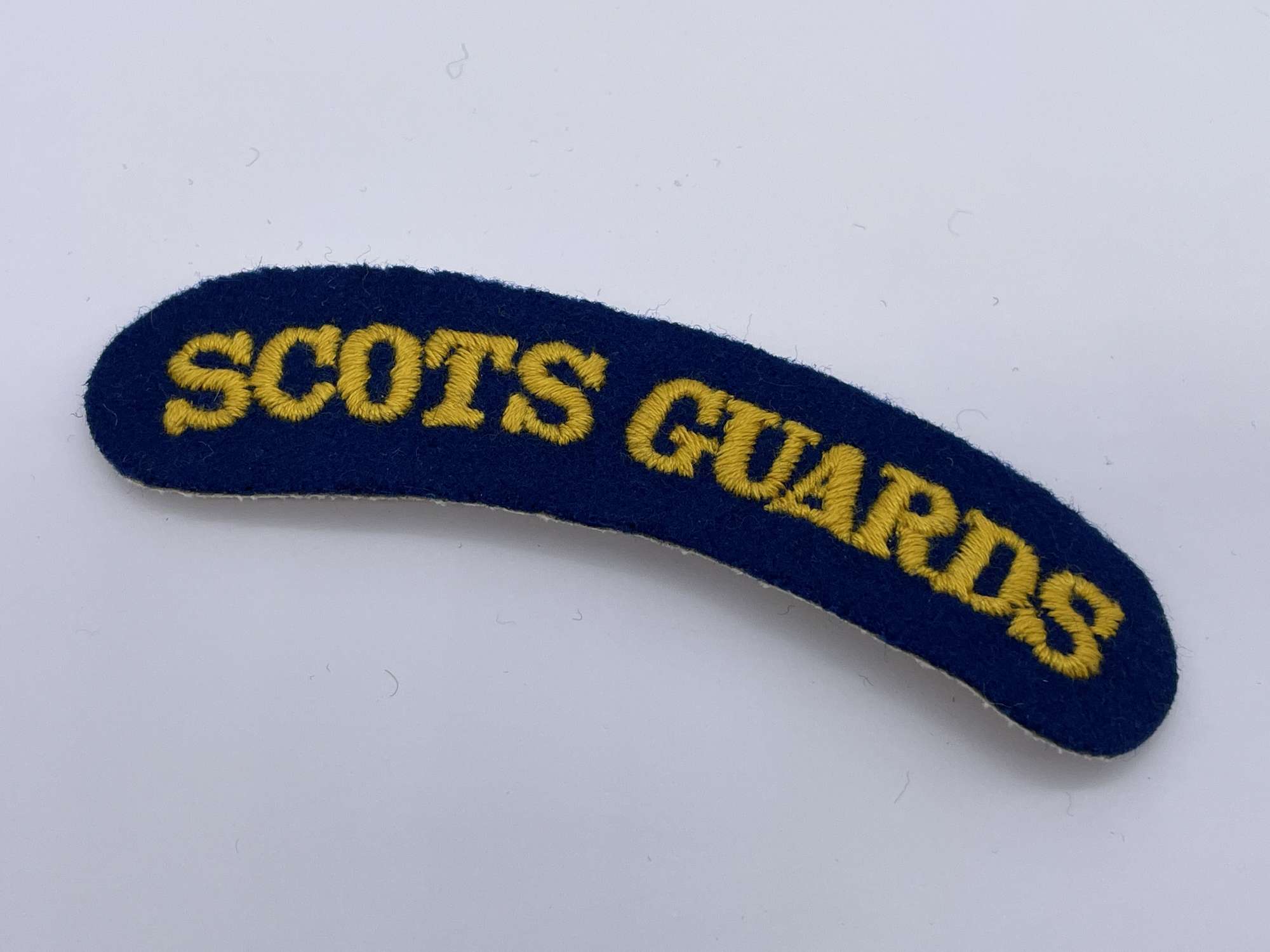 Original Post World War Two British Shoulder Title, New-Old Stock, Scots Guards