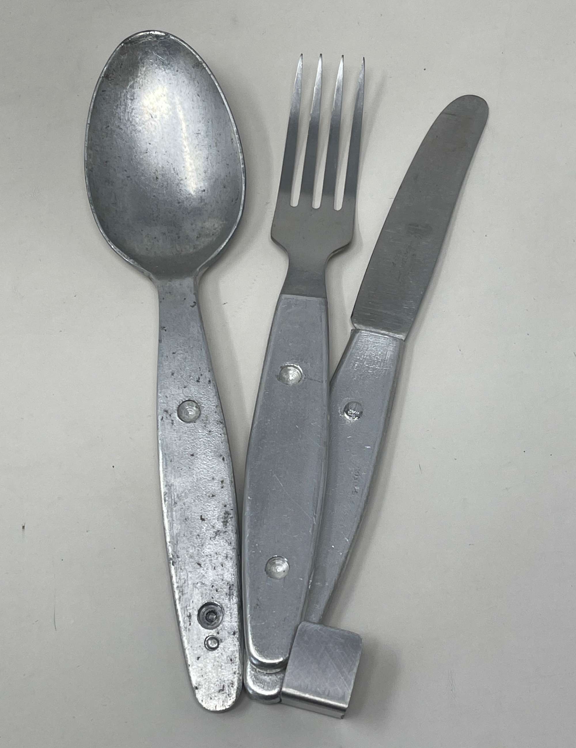 Knife, fork, and Spoon set dated 1944 Compactium