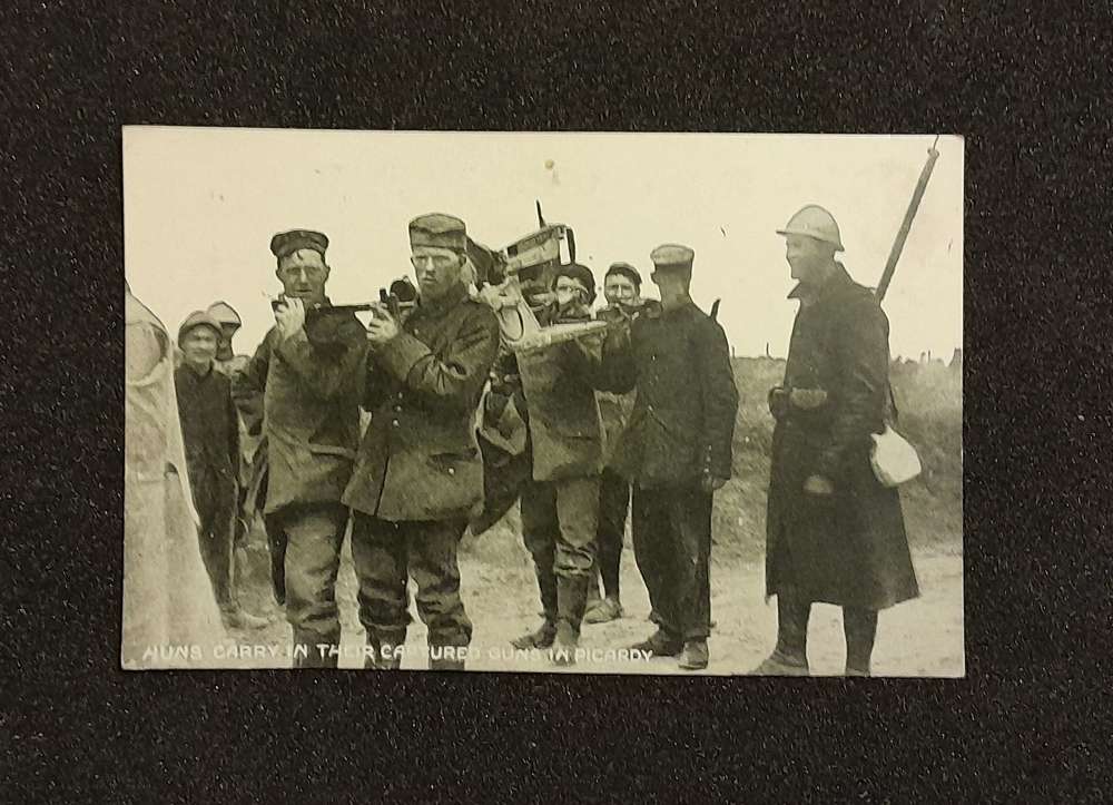 Huns carrying their captured guns