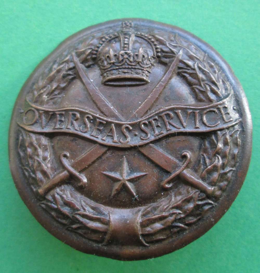 AN OVERSEAS SERVICE BADGE